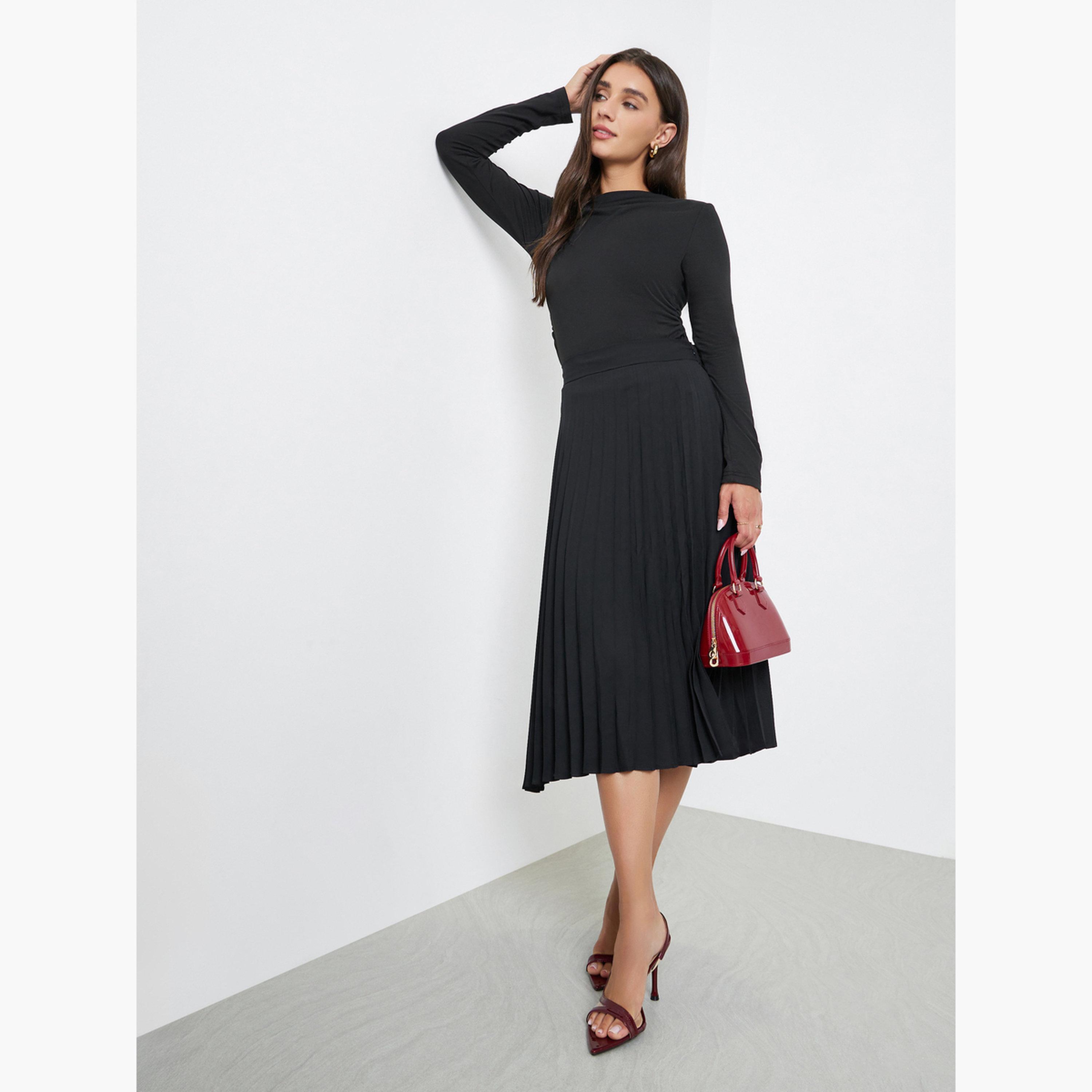 ستايلي - تنورة متوسط الطول مطوية لون أسود-women-clothing-bottoms-skirts-image-2