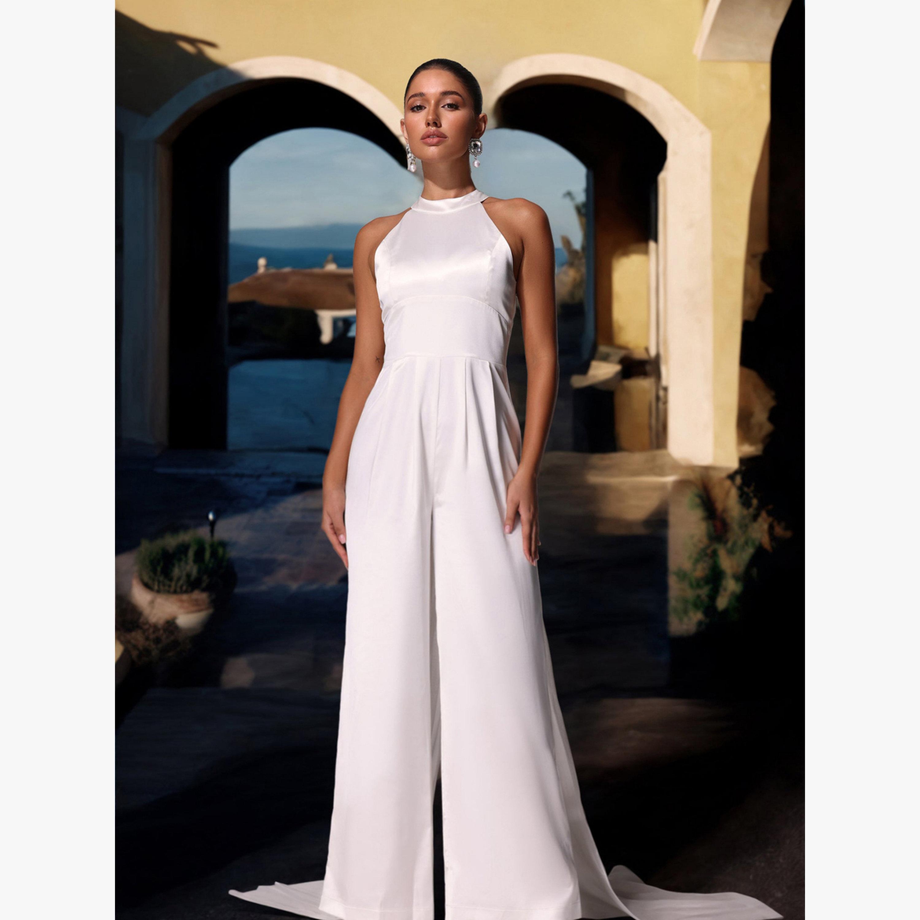 جامبسوت سادة بأرجل واسعة وبياقة رسن-women-clothing-jumpsuits-image-4