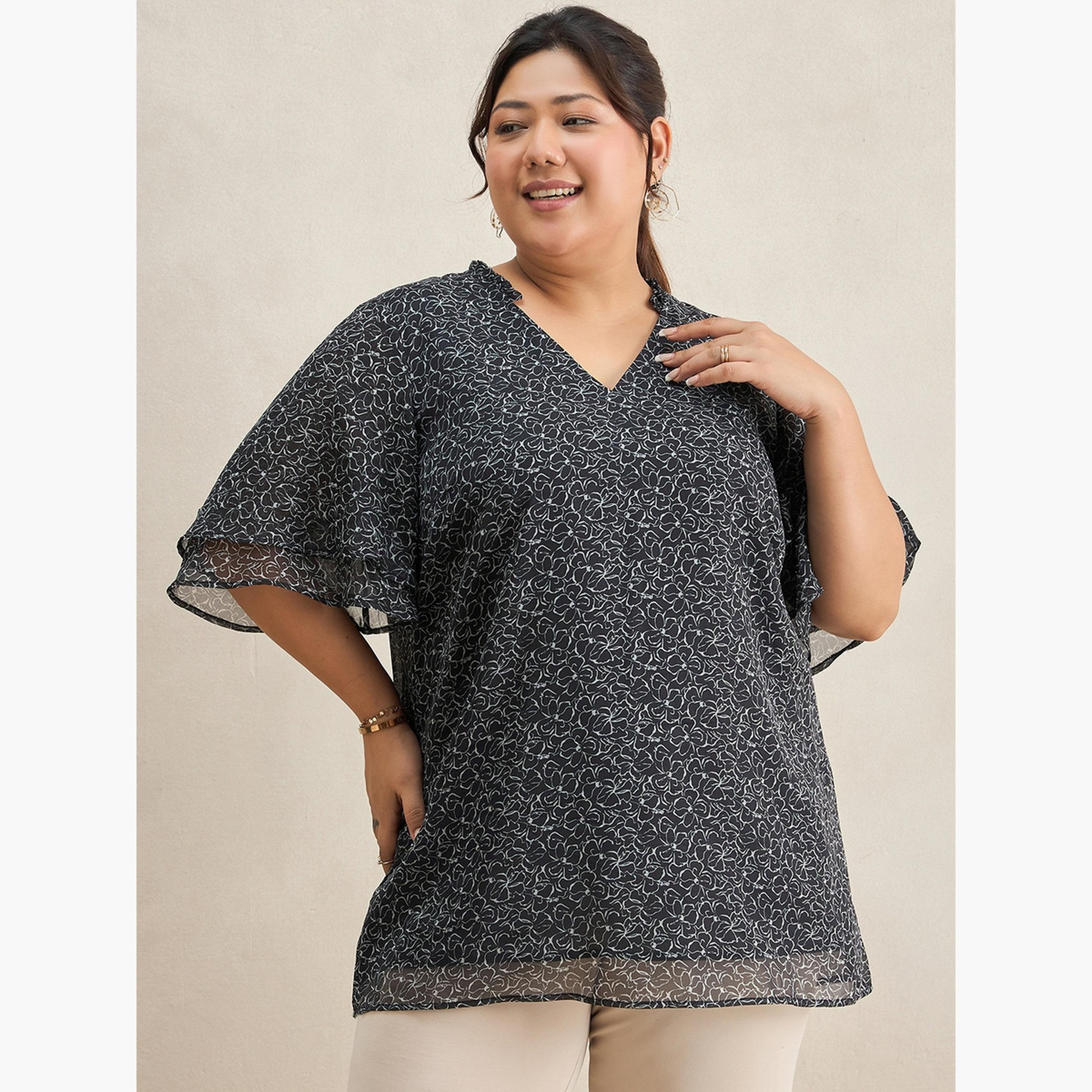 فيميلا - بلوزة تونيك بطبعة زهور سوداء مقاس واسع-women-clothing-tshirts-image-1