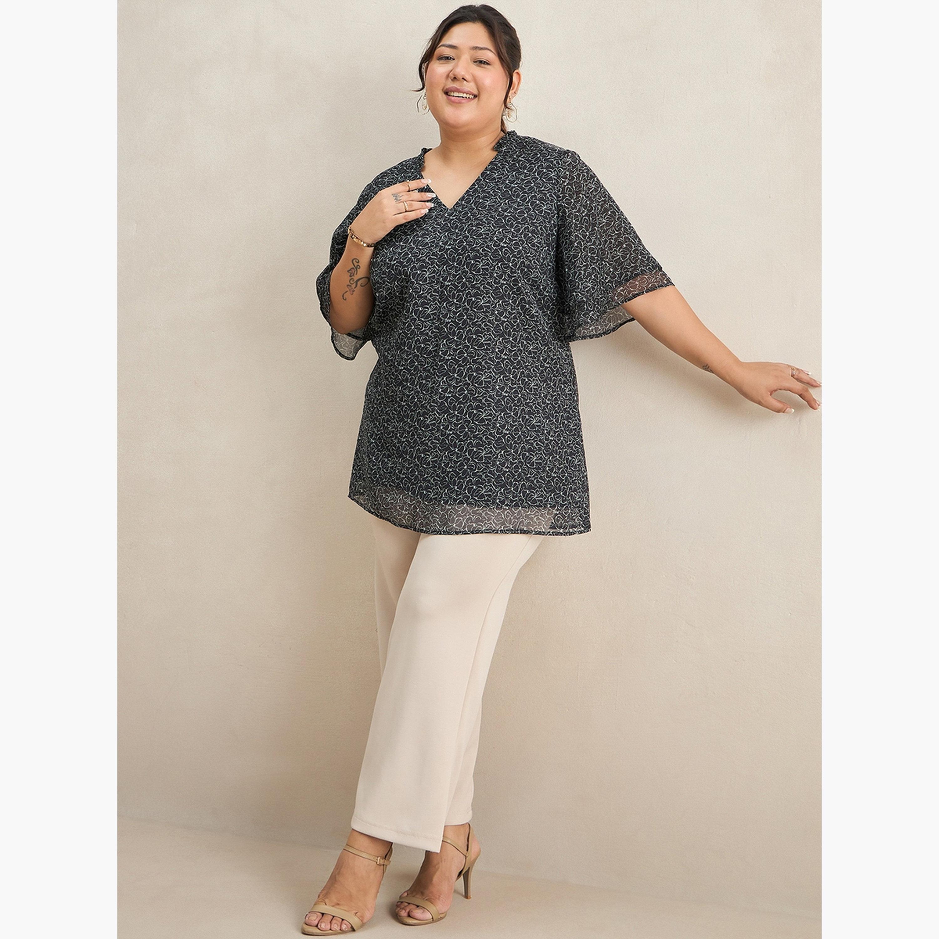 فيميلا - بلوزة تونيك بطبعة زهور سوداء مقاس واسع-women-clothing-tshirts-image-2