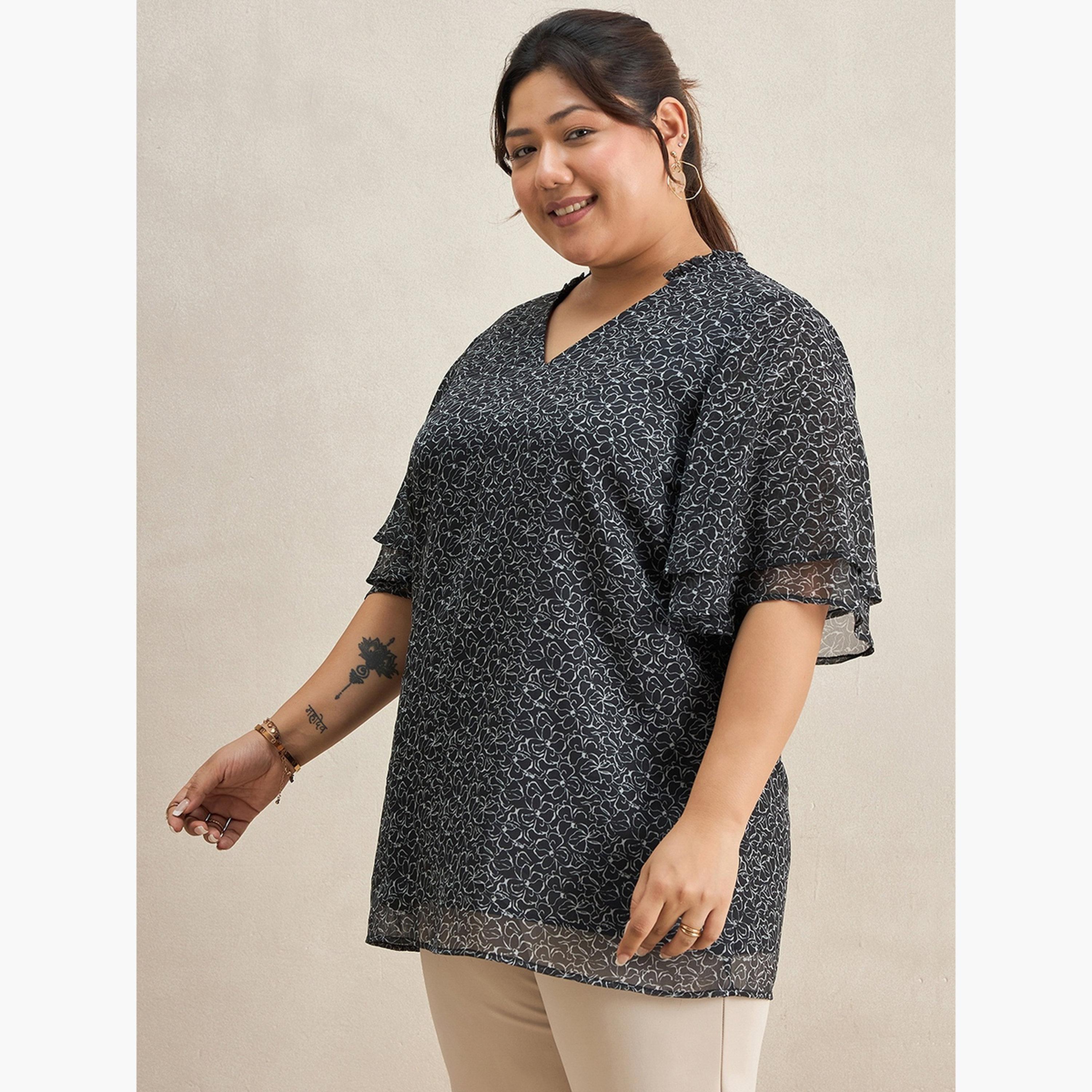 فيميلا - بلوزة تونيك بطبعة زهور سوداء مقاس واسع-women-clothing-tshirts-image-4