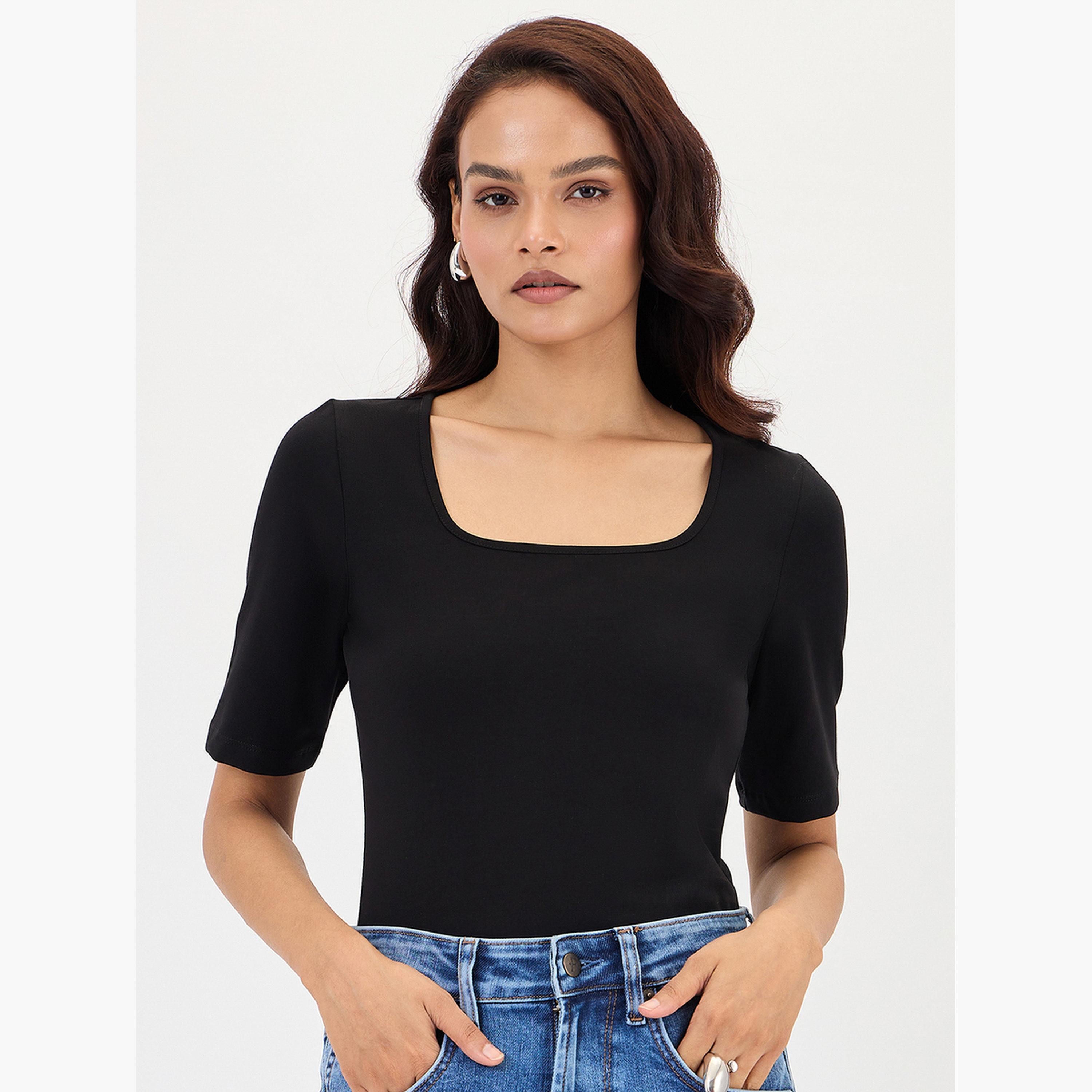 فيميلا - بدلة جسم محبوكة بأكمام قصيرة من القطن باللون الأسود-women-clothing-shirtsandblouses-blouses-image-1