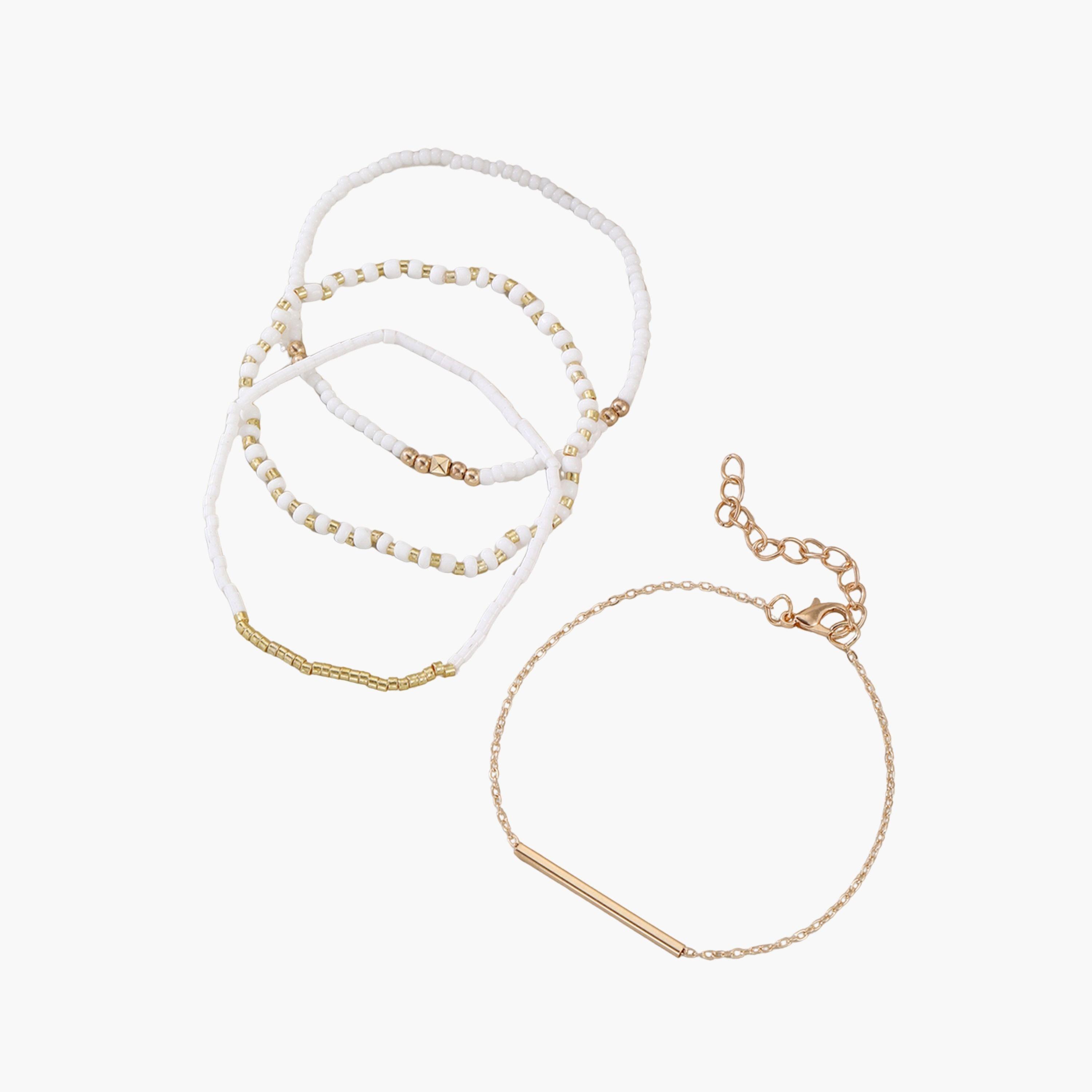 تيك تو - طقم من 4 أساور من الخرز الذهبي-women-watchesandjewellery-jewellery-banglesandbracelets-image-1