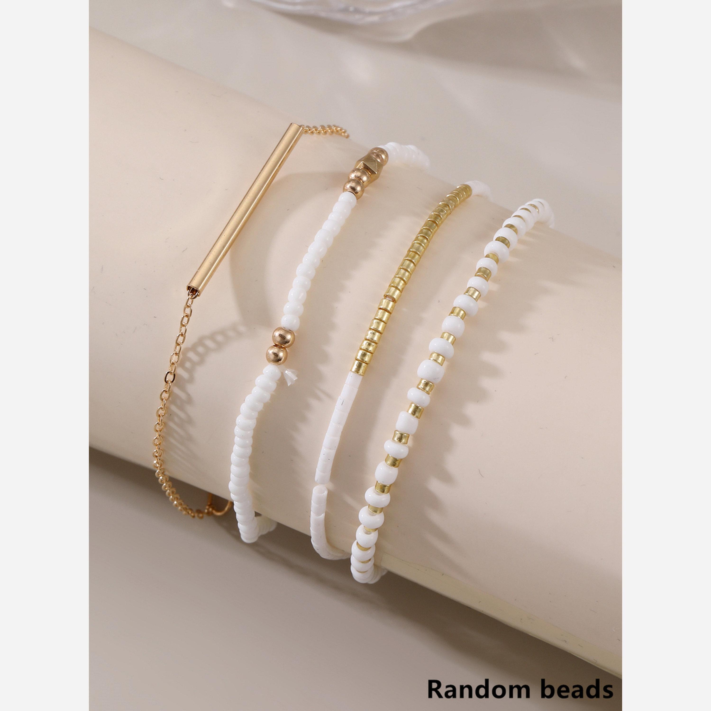 تيك تو - طقم من 4 أساور من الخرز الذهبي-women-watchesandjewellery-jewellery-banglesandbracelets-image-4