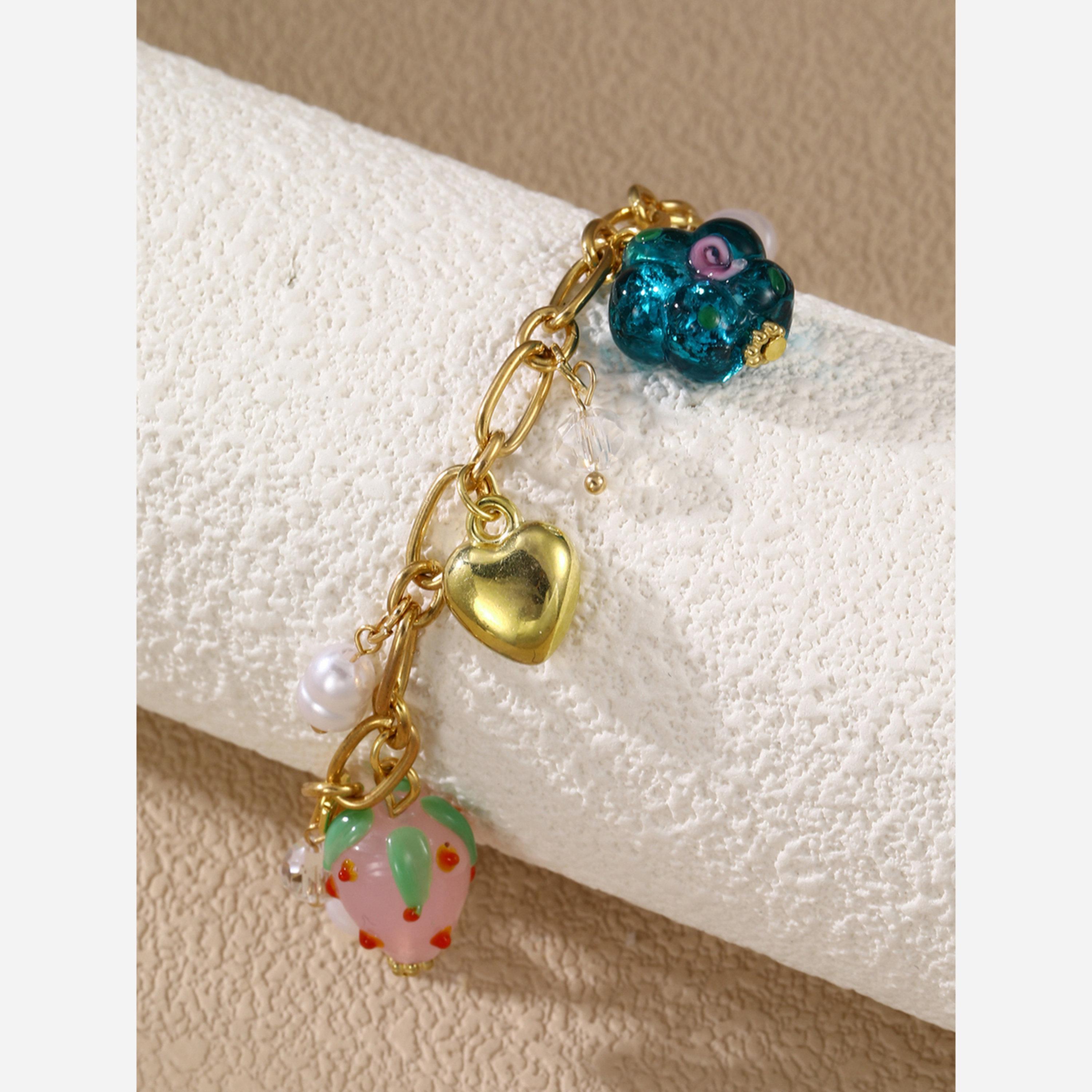 تيك تو - سوار مزين بللؤلؤ صناعي على شكل قلب وفراولة وزهور.-women-watchesandjewellery-jewellery-banglesandbracelets-image-2