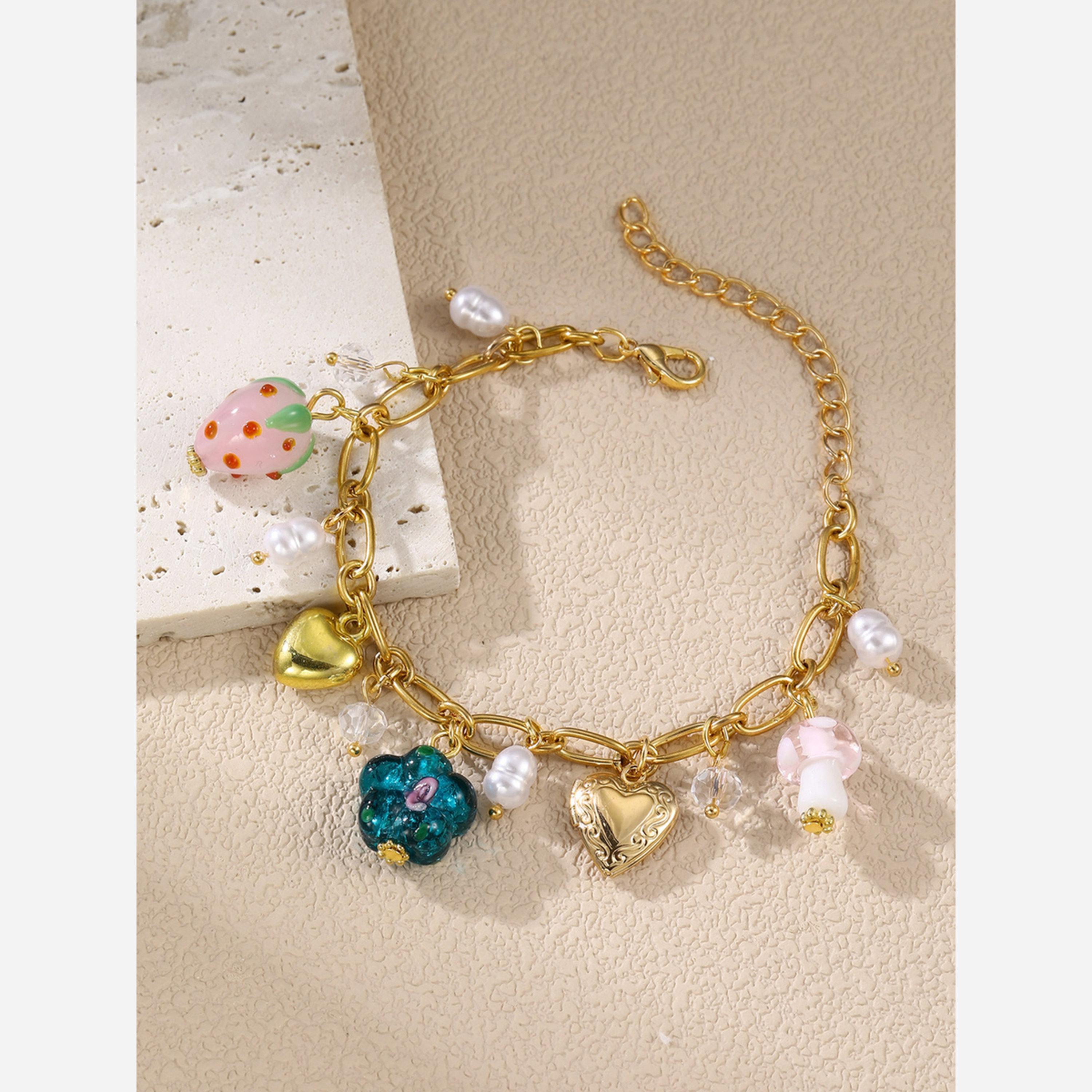 تيك تو - سوار مزين بللؤلؤ صناعي على شكل قلب وفراولة وزهور.-women-watchesandjewellery-jewellery-banglesandbracelets-image-3