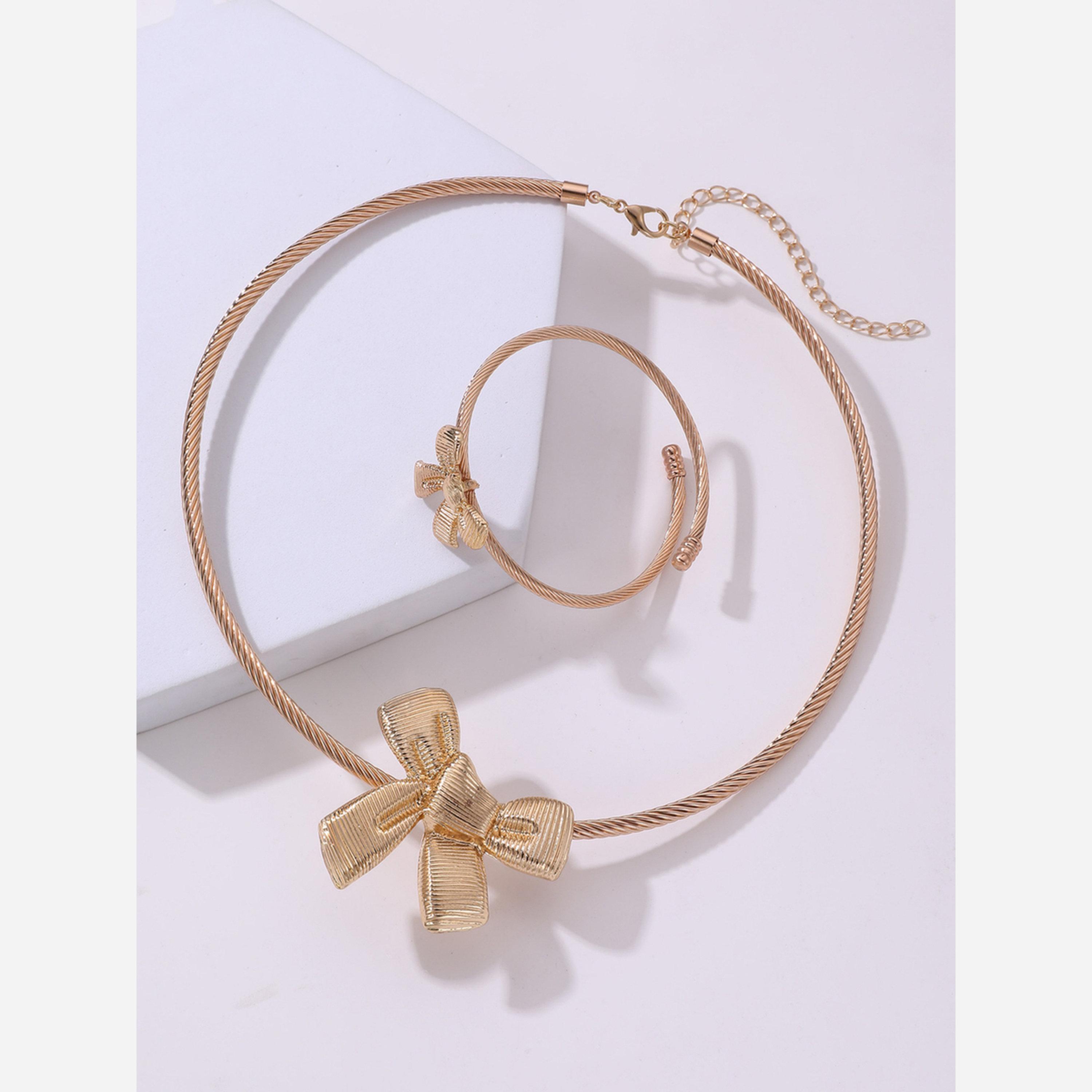 تيك تو - طقم من قطعتين - قلادة ذهبية على شكل فيونكة مع سوار-women-watchesandjewellery-jewellery-jewellerysets-image-4