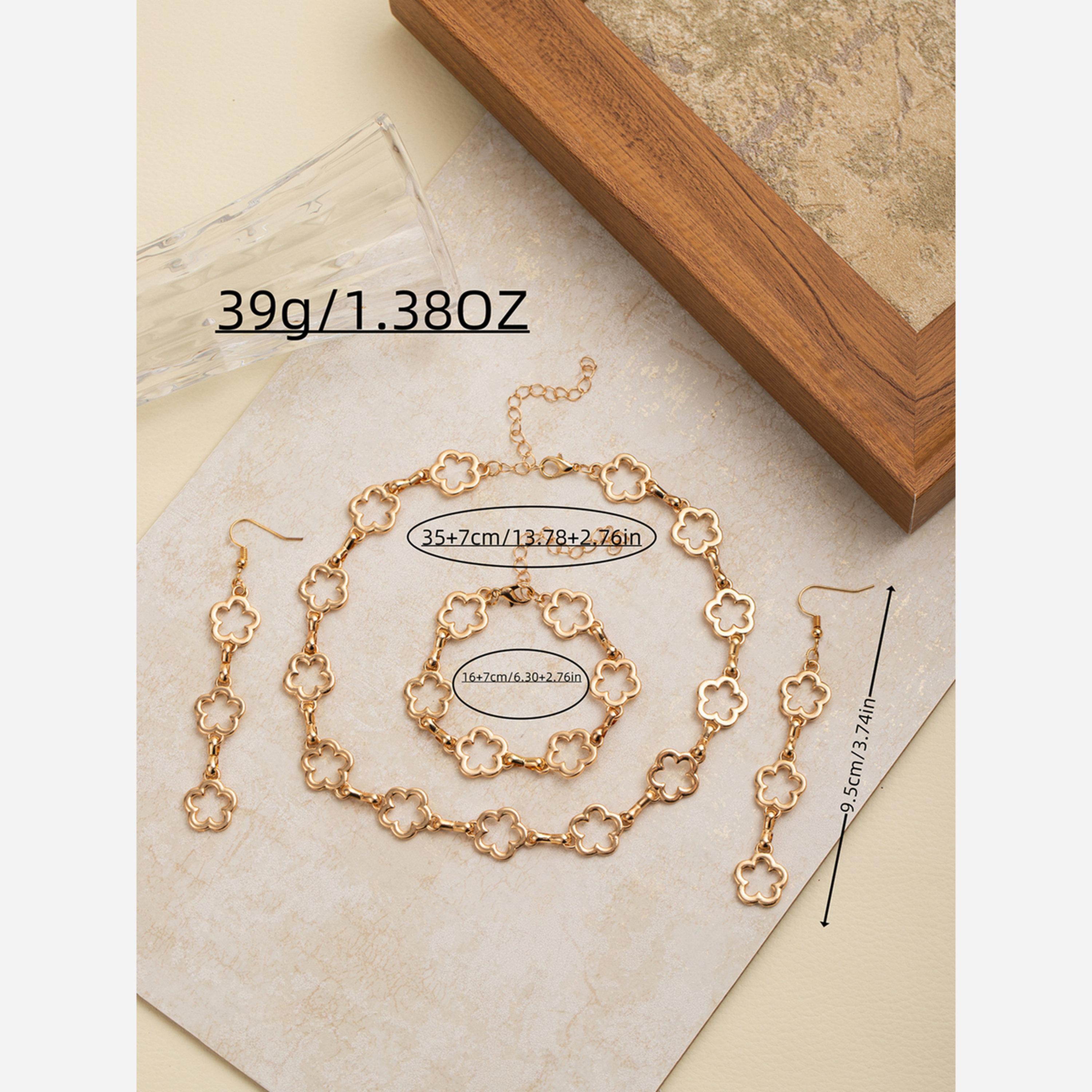 تيك تو - طقم من 3 قطع - قلادة ذهبية مزينة بزهرة مع سوار وأقراط-women-watchesandjewellery-jewellery-jewellerysets-image-6