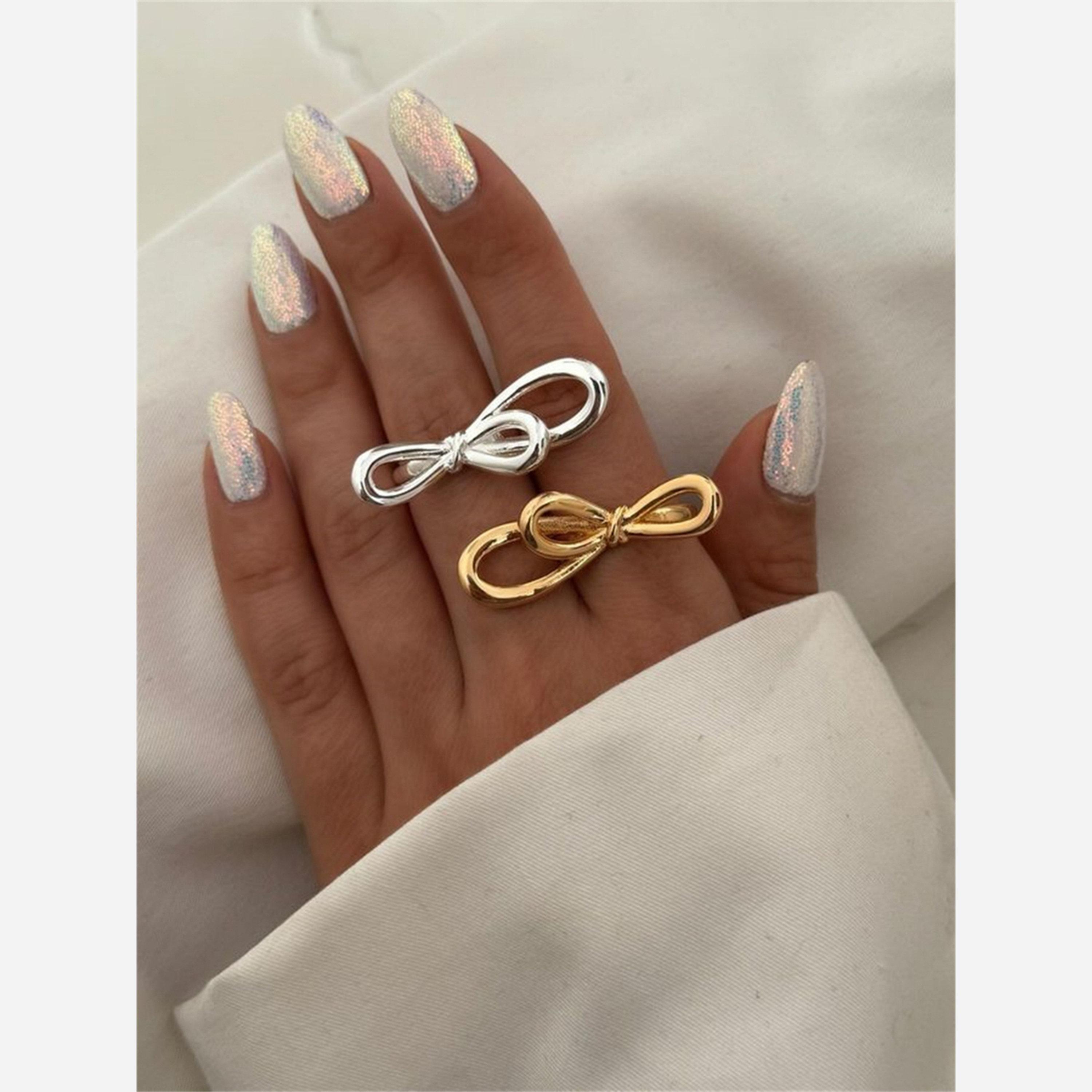 Take Two Silver Bow Open Ring-women-watchesandjewellery-jewellery-rings-image-2