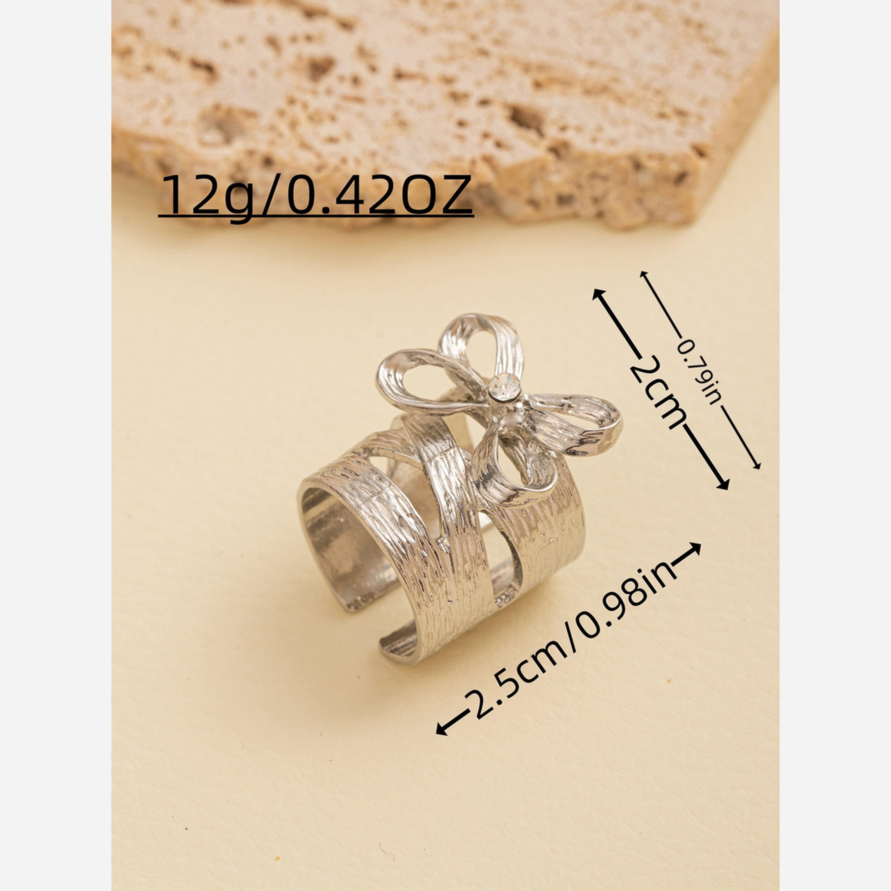 تيك تو - خاتم فضي مفتوح على شكل فيونكة-women-watchesandjewellery-jewellery-rings-image-3