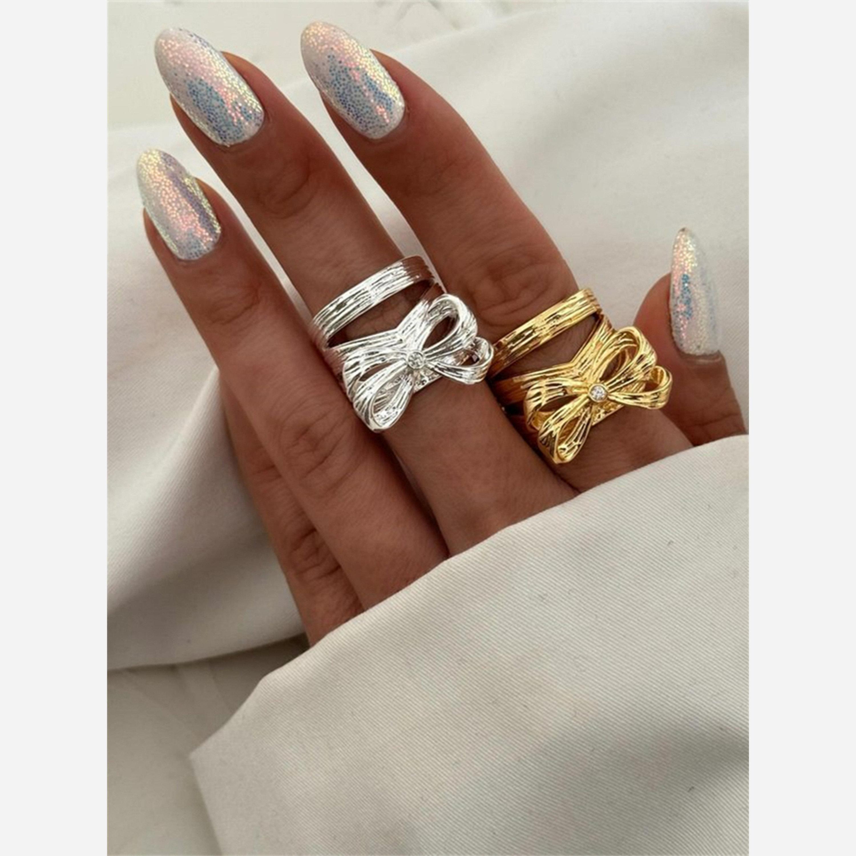 تيك تو - خاتم فضي مفتوح على شكل فيونكة-women-watchesandjewellery-jewellery-rings-image-5