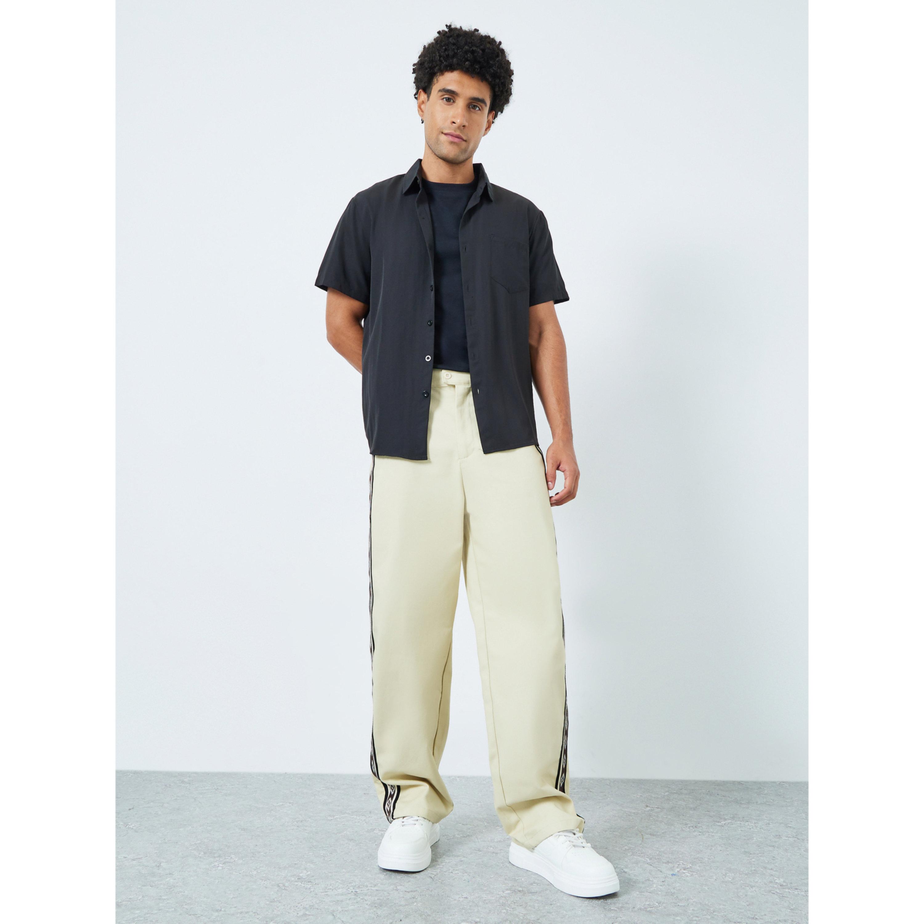 بنطال واسع بتفاصيل أشرطة-men-clothing-bottoms-trousersandchinos-trousers-image-2
