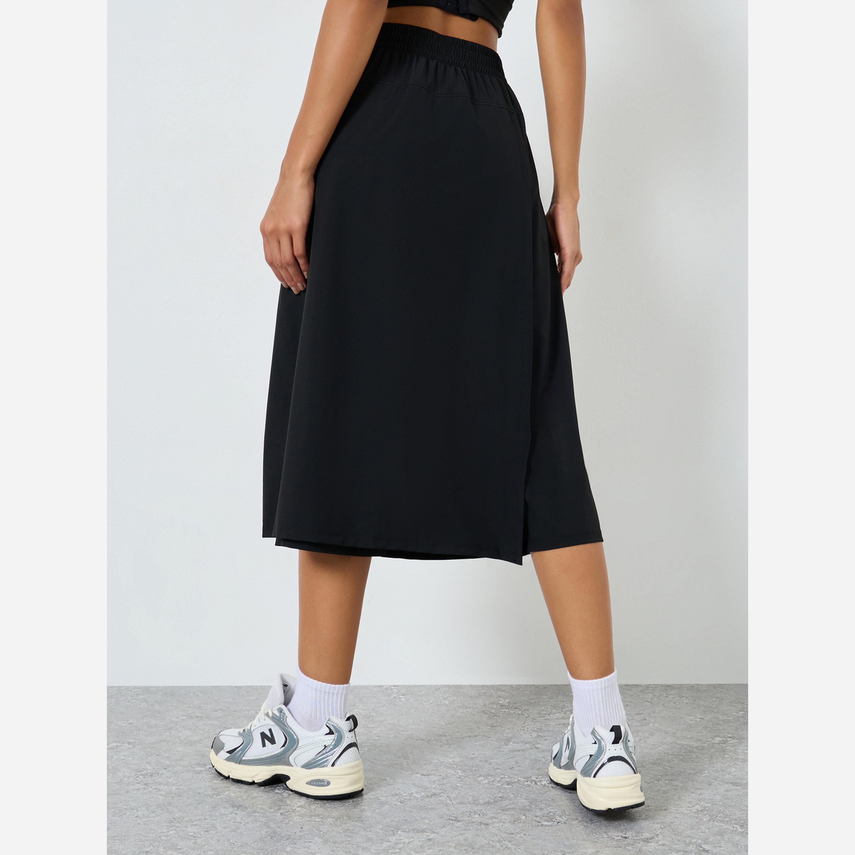 ستايلي - تنورة للنساء لون أسود بخصر مطاطي-women-clothing-sportswearandactivewear-bottoms-athleticskirtsandshorts-image-4