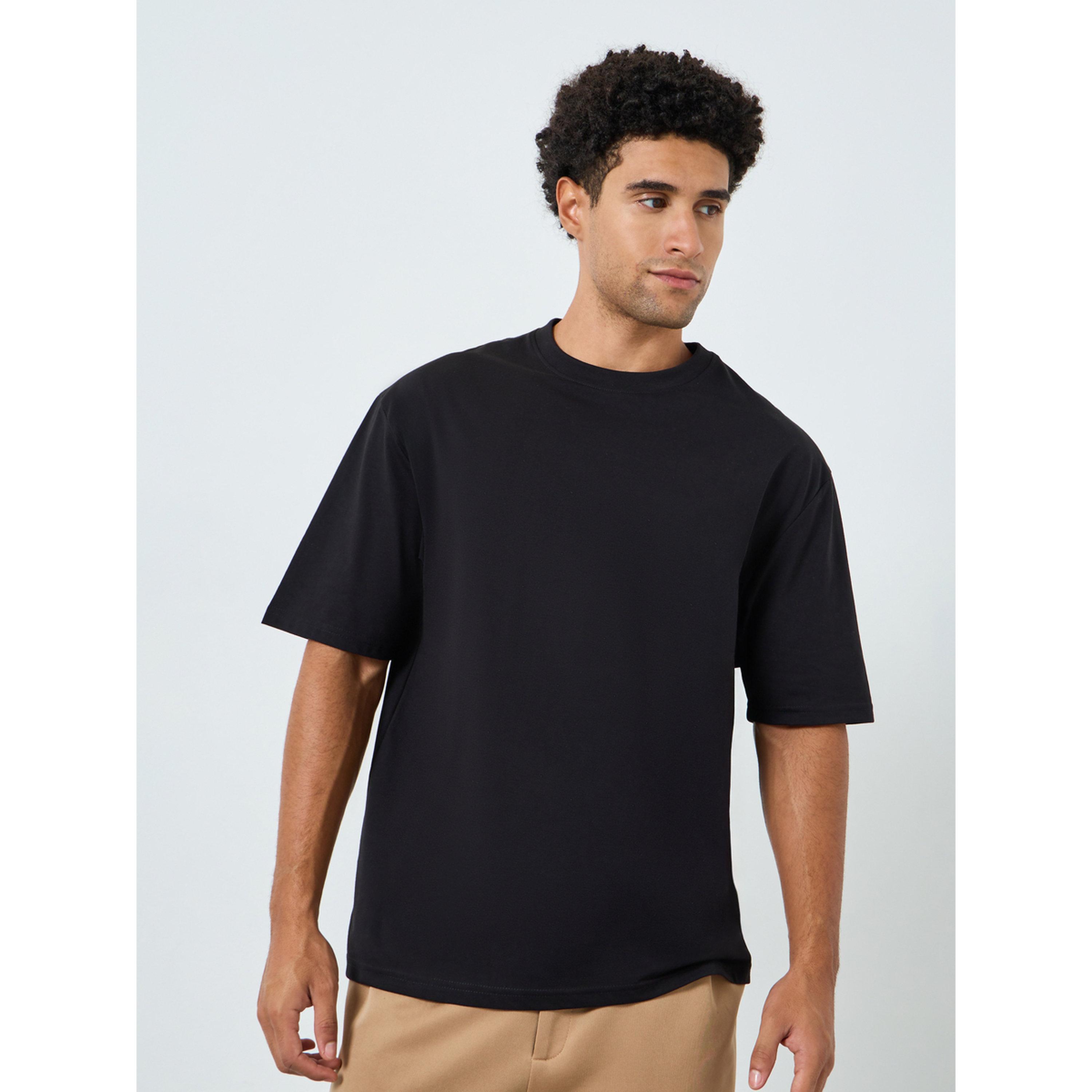 تيشيرت واسع بطبعة جرافيك وياقة مستديرة-men-clothing-tshirtsandpolos-tshirts-image-1