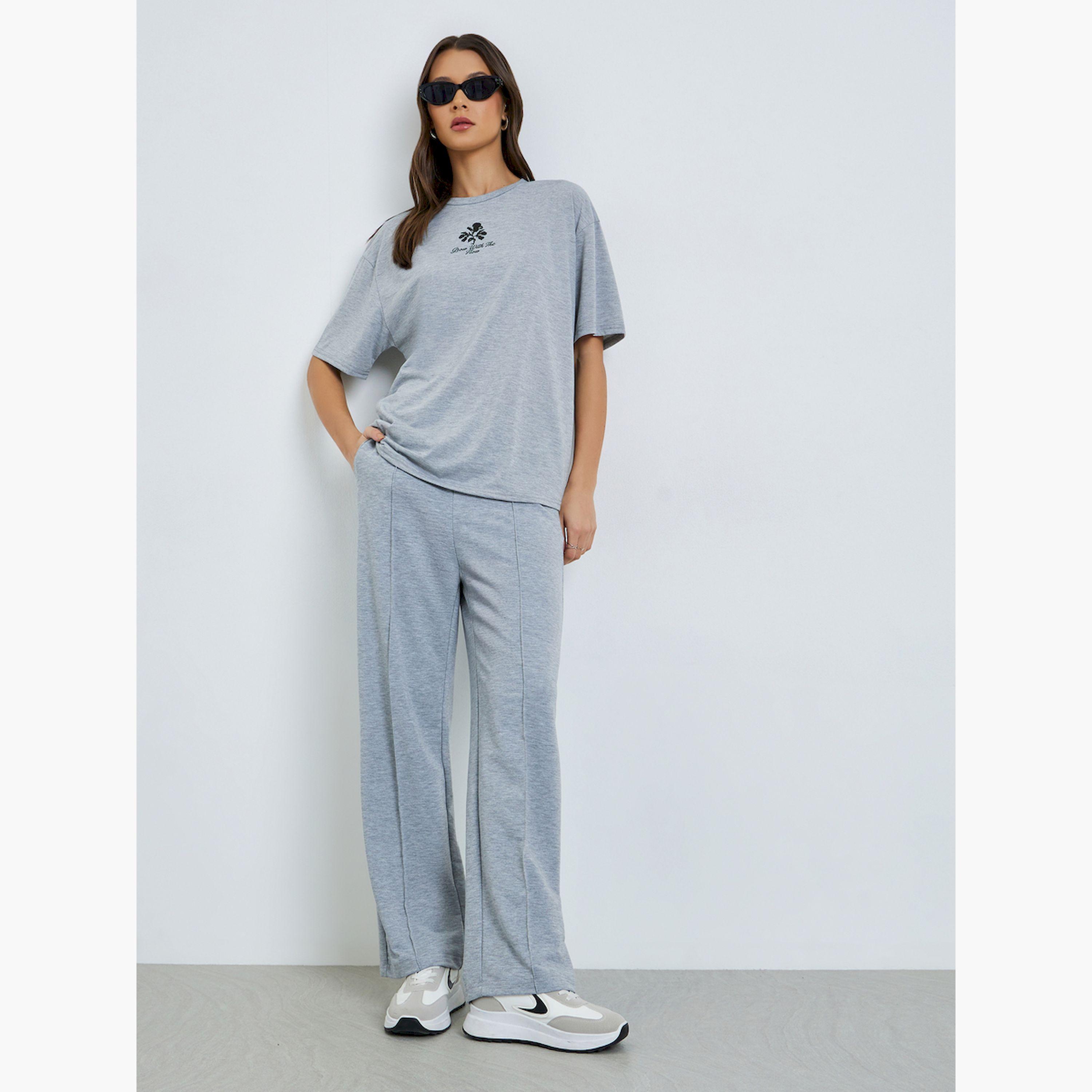 تيشيرت واسع بطبعة جرافيك-women-clothing-tshirts-image-2