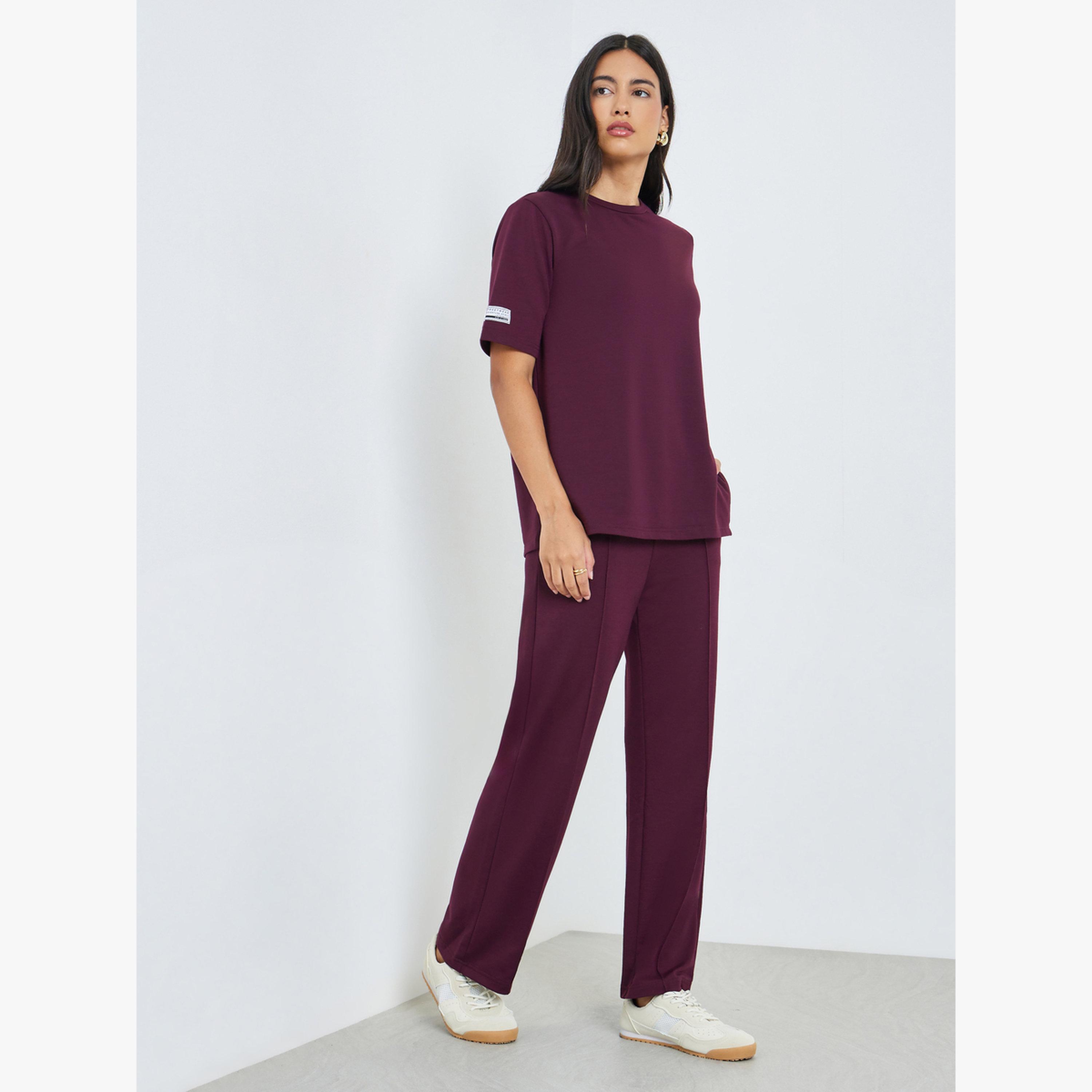 جوغر بأرجل واسعة وتفاصيل محزوزة-women-clothing-bottoms-joggers-image-2