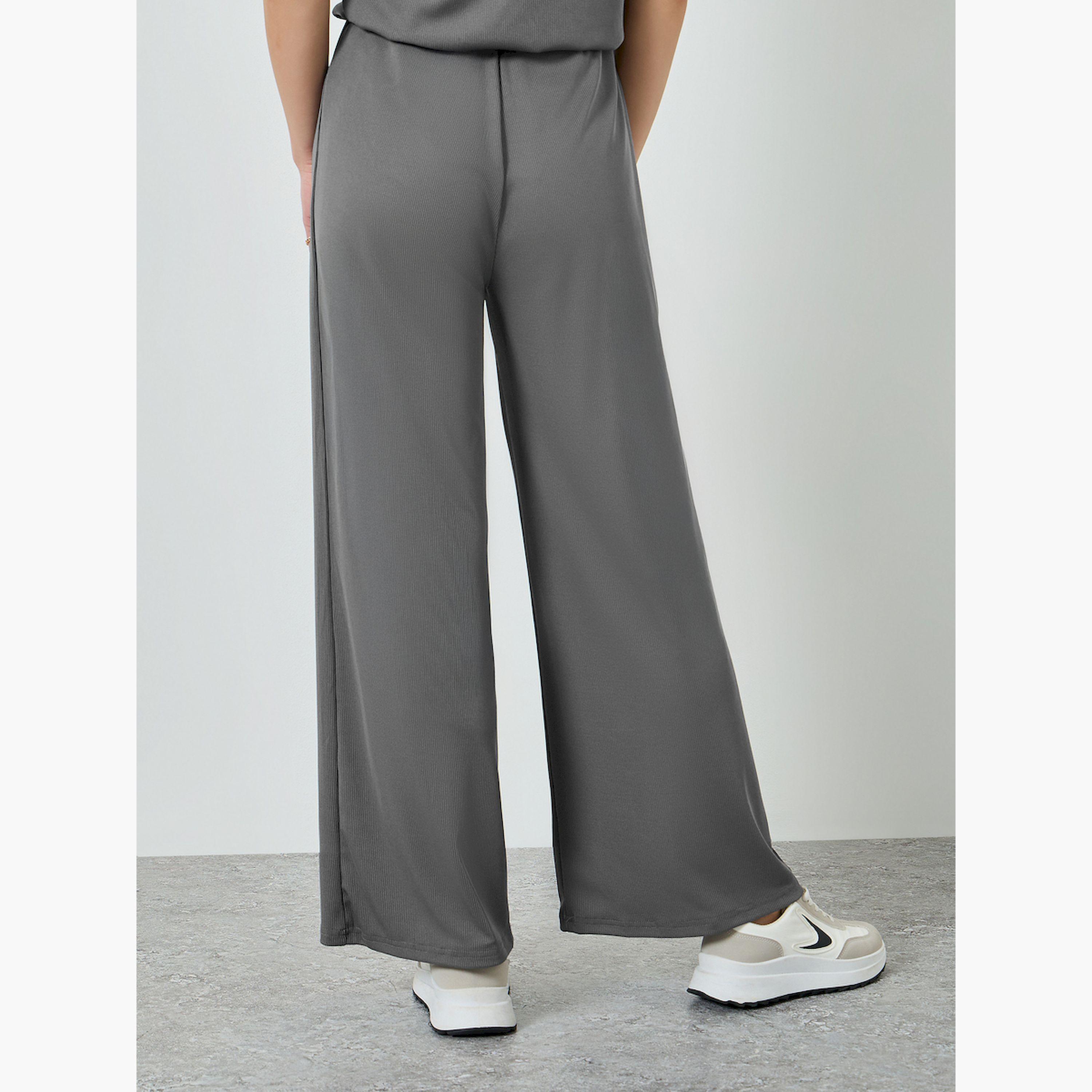 بنطال جوغر مضلع بأرجل واسعة-women-clothing-bottoms-joggers-image-4