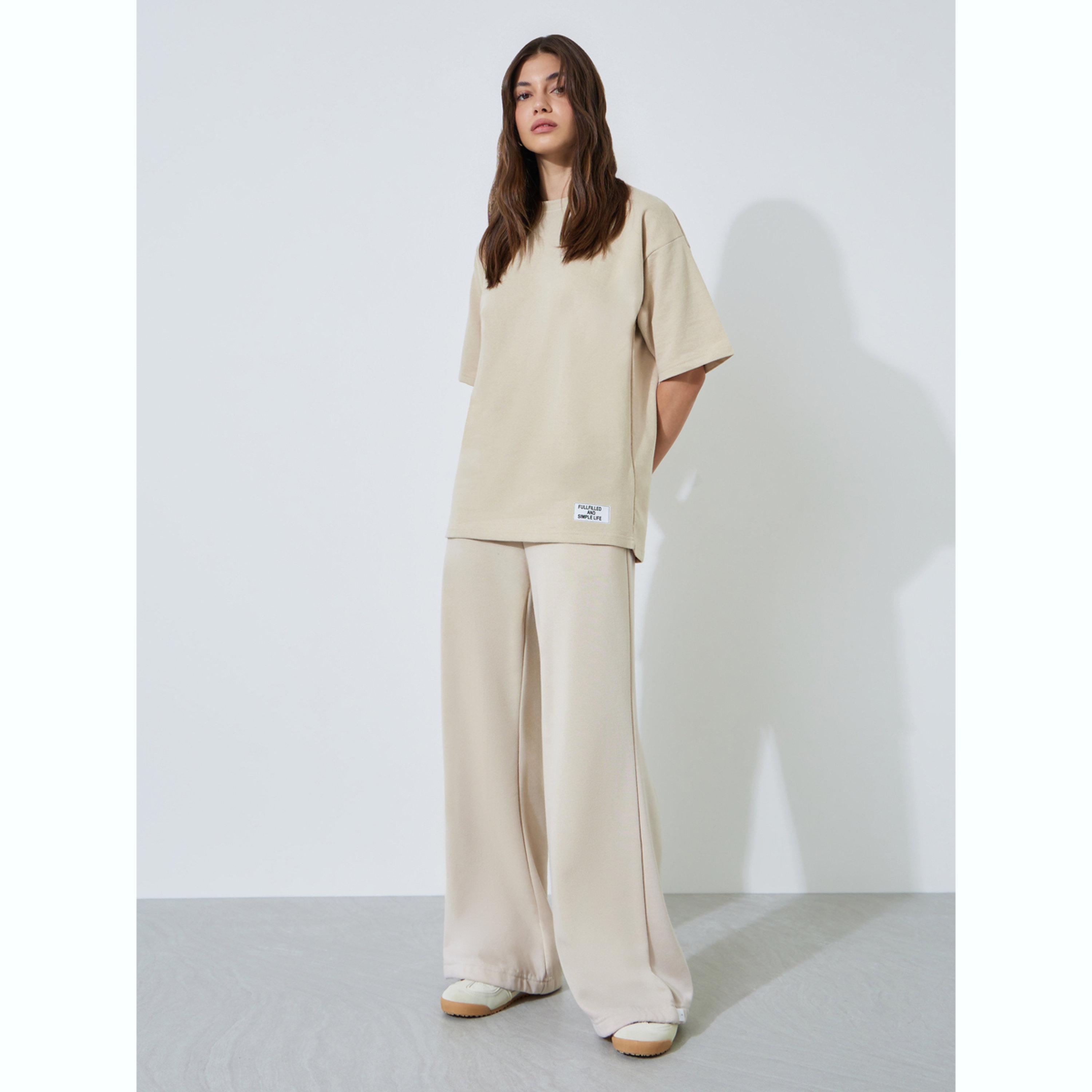 Styli Beige Oversized Essentials Print T-Shirt-women-clothing-tshirts-image-2