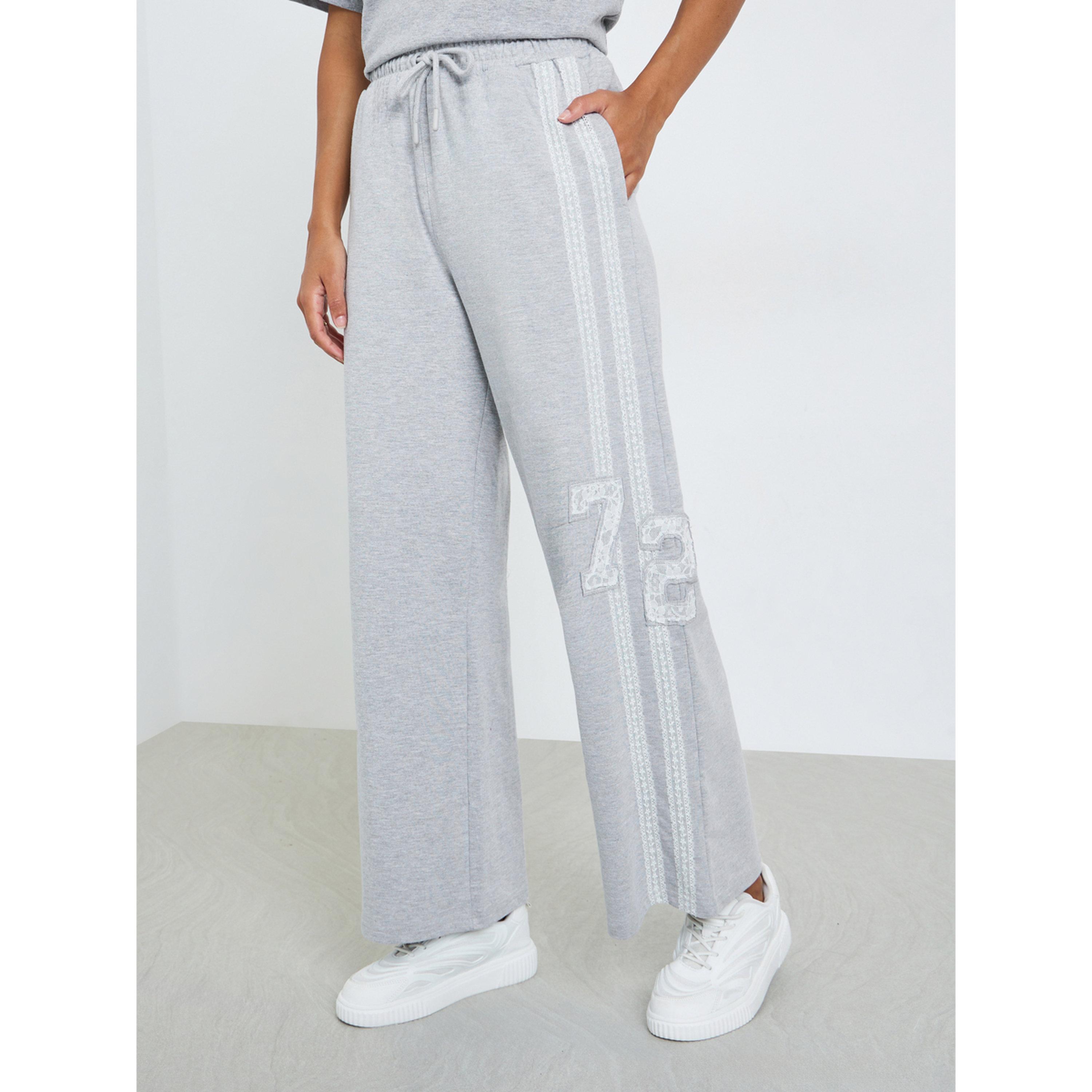 جوغر بأرجل واسعة وتفاصيل دانتيل-women-clothing-bottoms-joggers-image-1