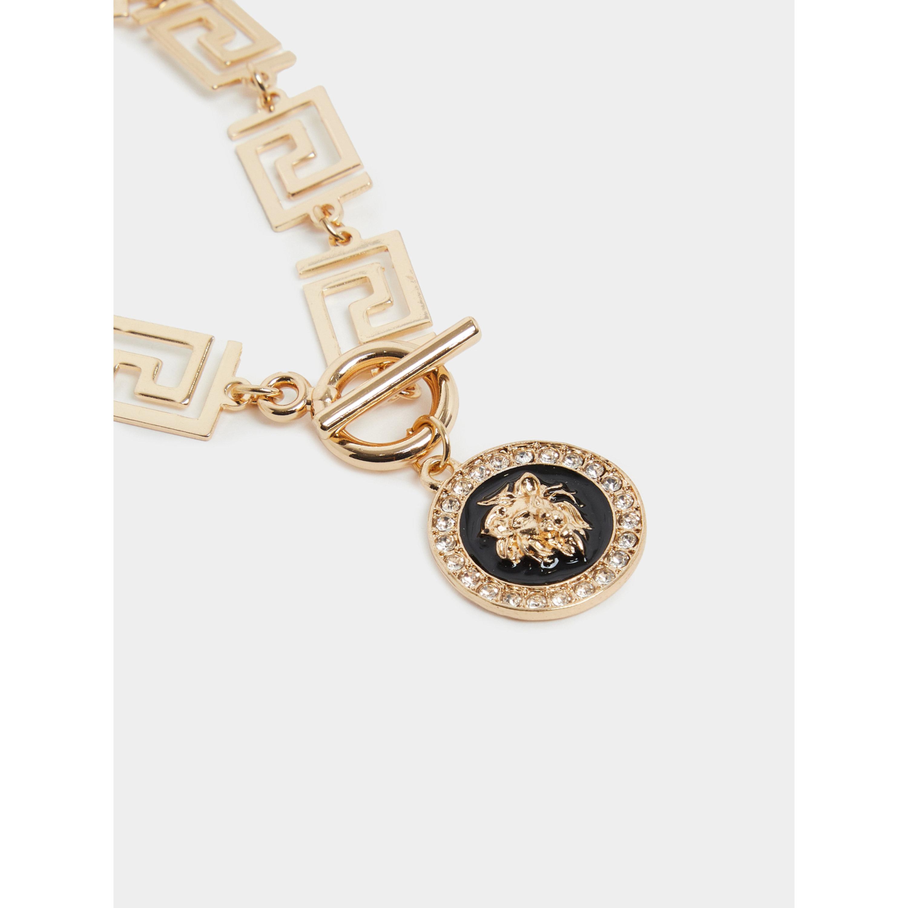 سوار بحلقات متصلة ودلاية مدالية ذهبية-women-watchesandjewellery-jewellery-banglesandbracelets-image-2