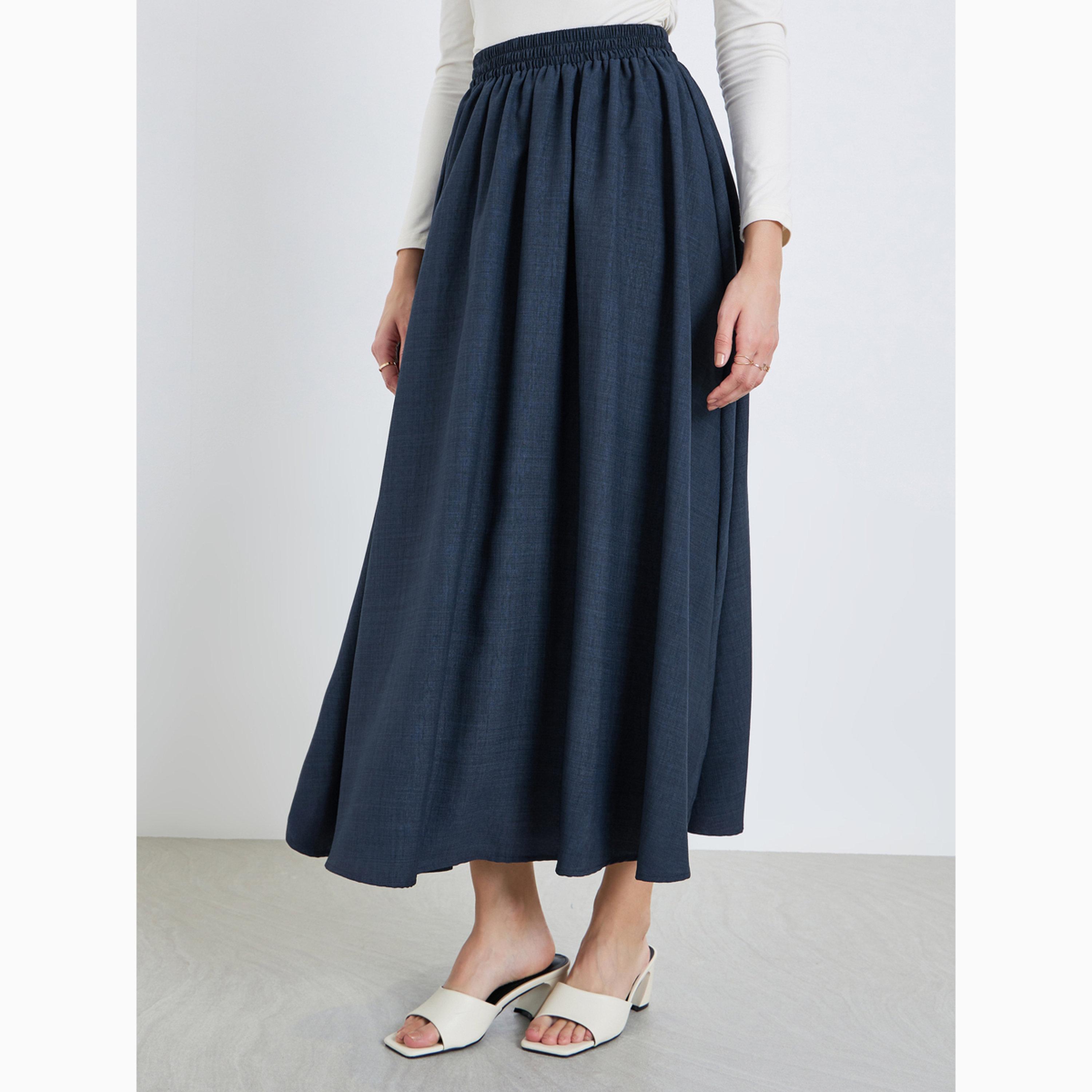 تنورة طويلة بحافة واسعة وتفاصيل بارزة الملمس-women-clothing-bottoms-skirts-image-1