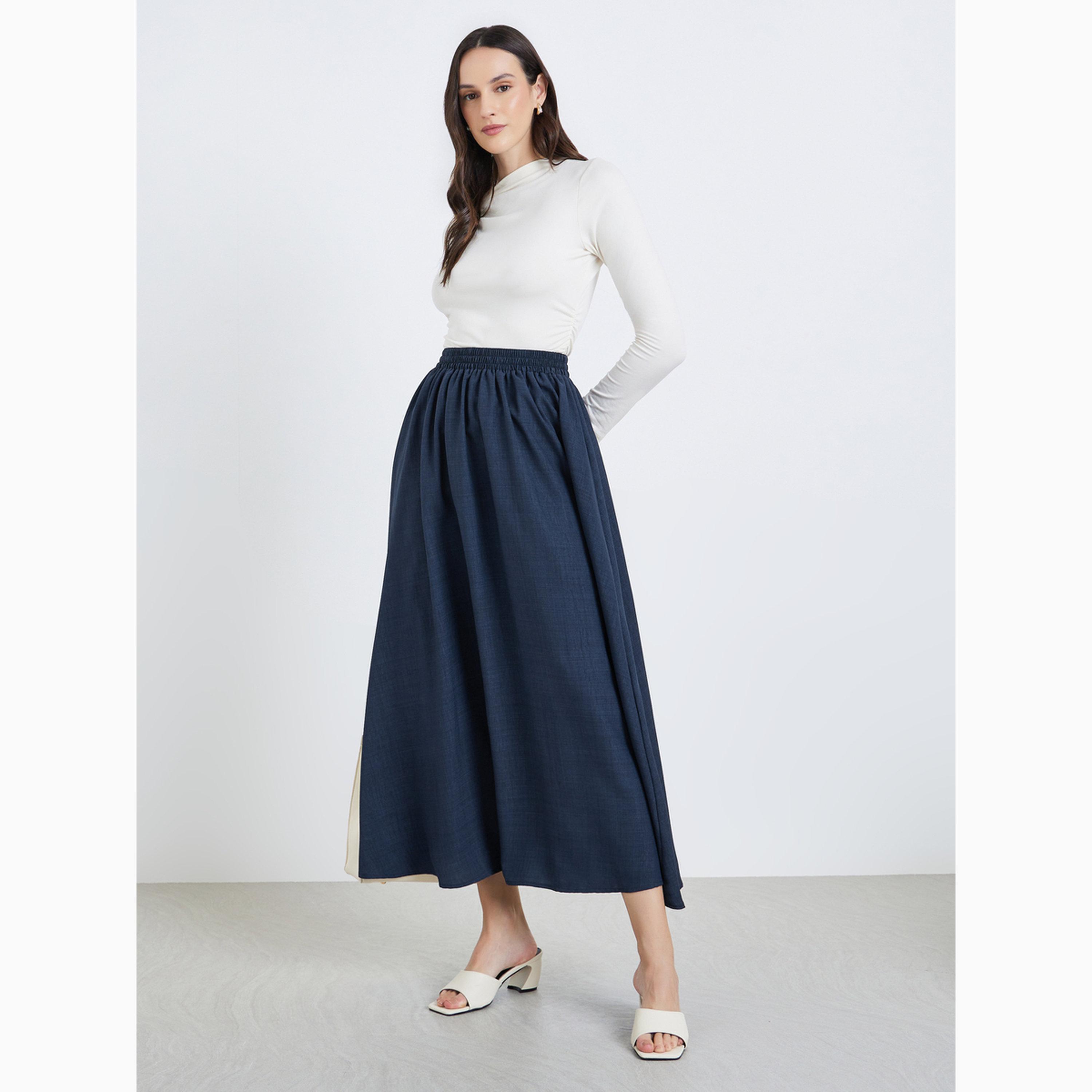 تنورة طويلة بحافة واسعة وتفاصيل بارزة الملمس-women-clothing-bottoms-skirts-image-2