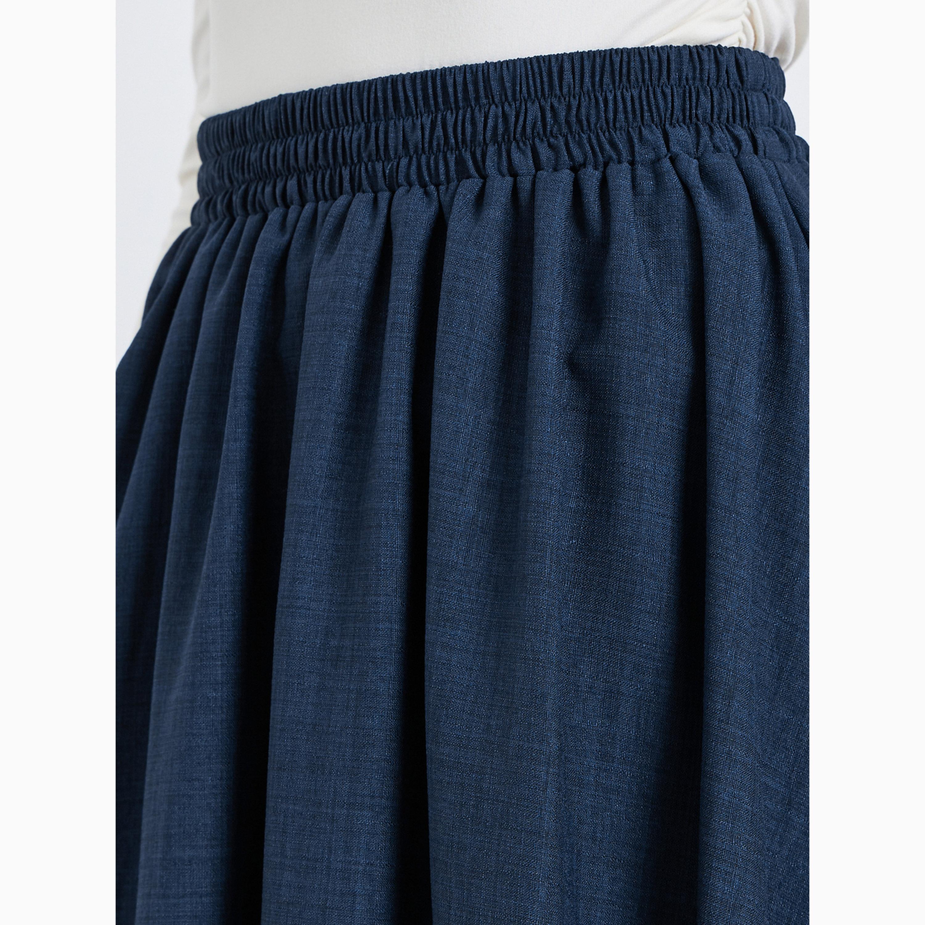 تنورة طويلة بحافة واسعة وتفاصيل بارزة الملمس-women-clothing-bottoms-skirts-image-3