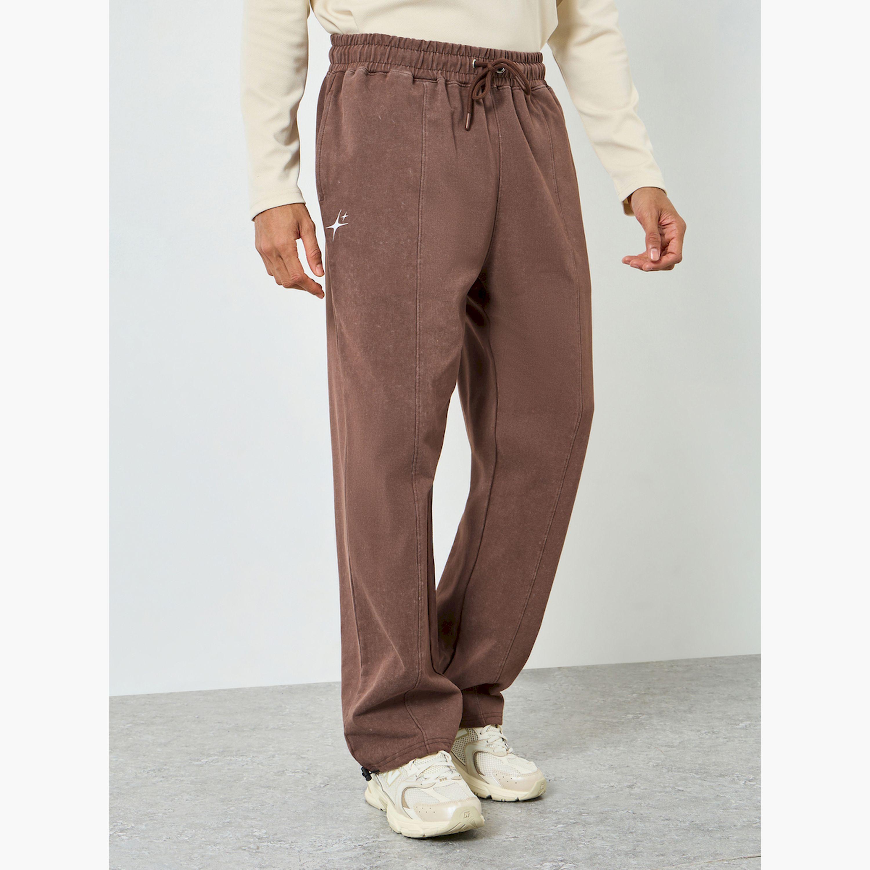 جوغر باهت بقصة مريحة للرجال-men-clothing-bottoms-joggers-image-1