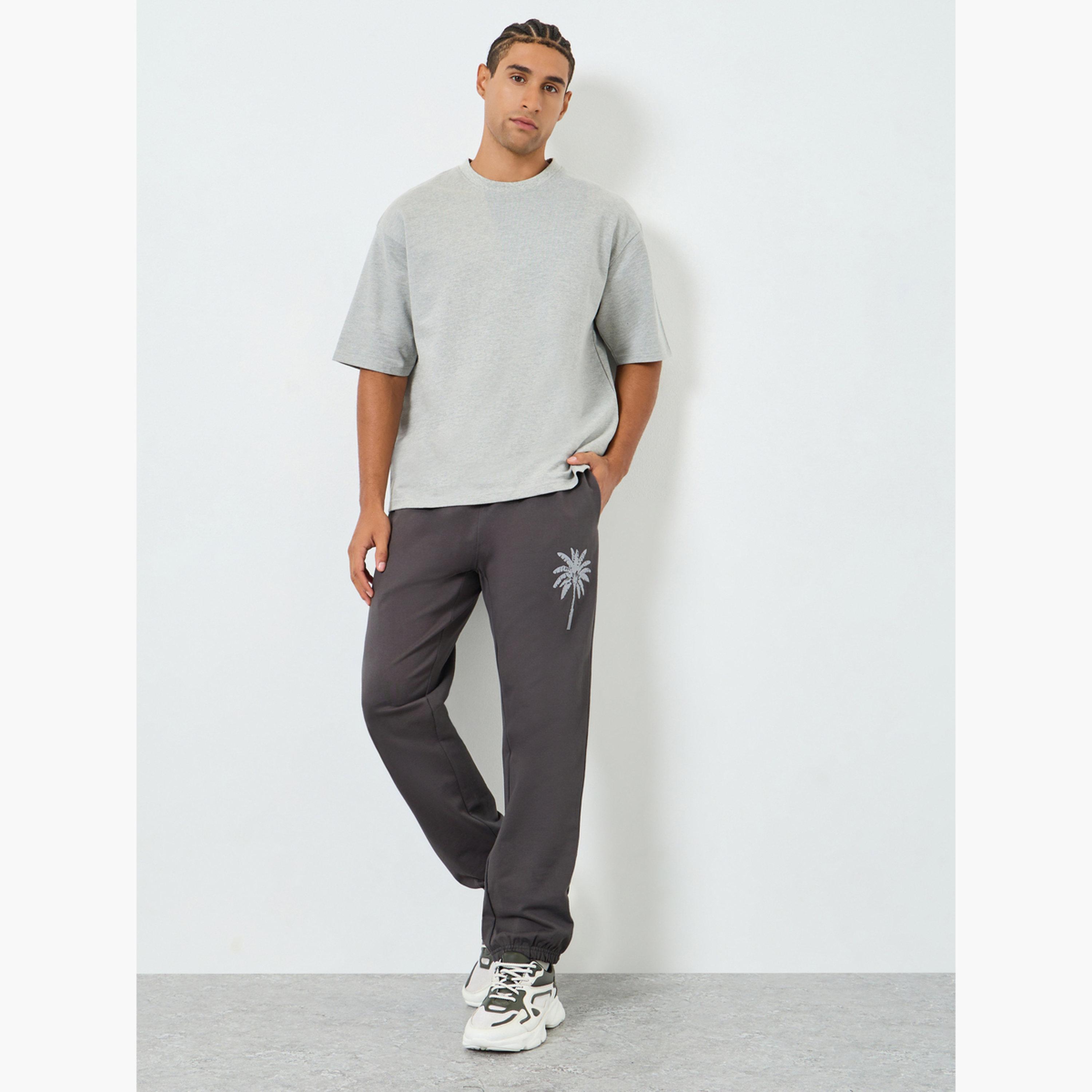 Styli Men Slim Fit Palm Embroidery Joggers-men-clothing-bottoms-joggers-image-2