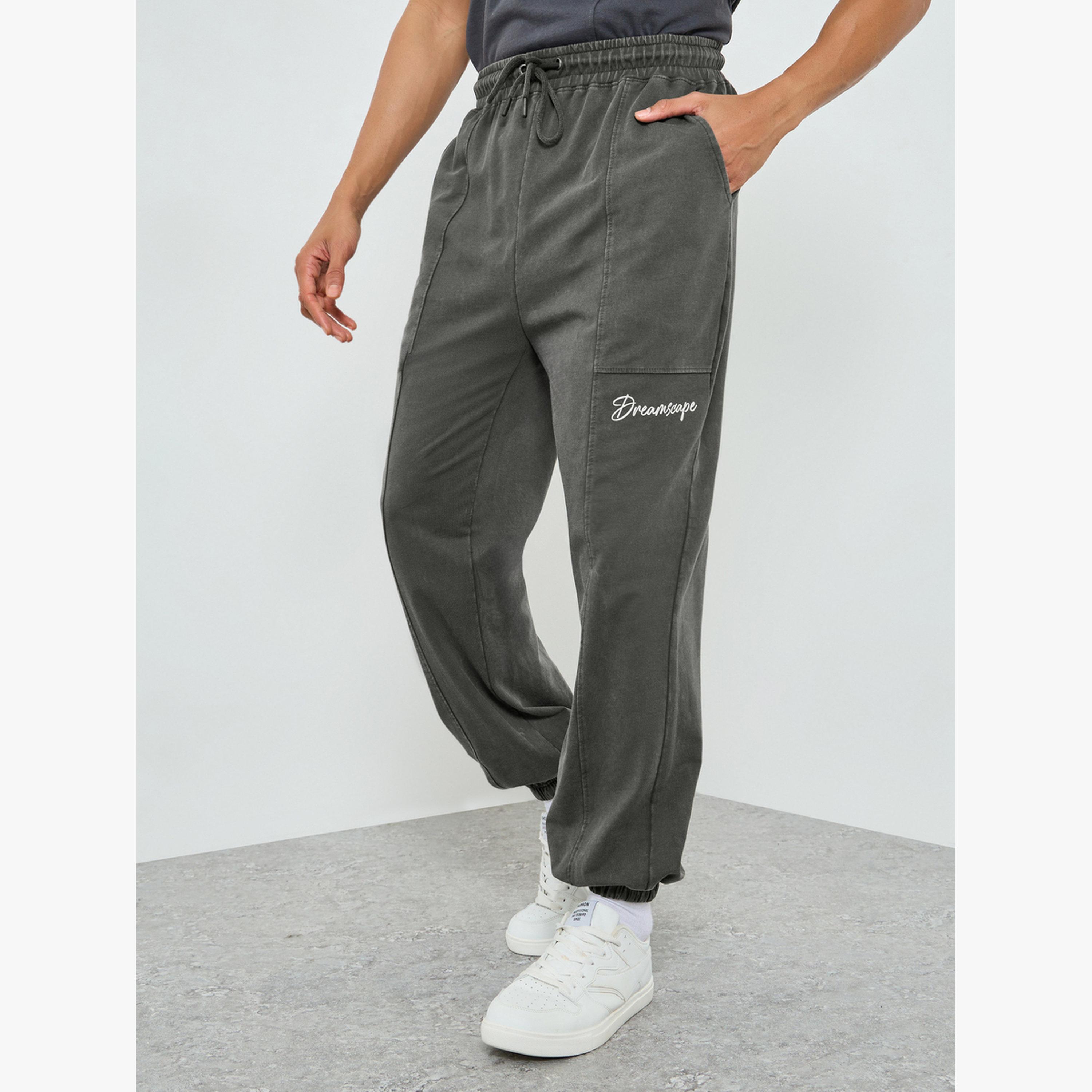 جوغر قصة واسعة بأجزاء مباينة وغسيل باهت-men-clothing-bottoms-joggers-image-1