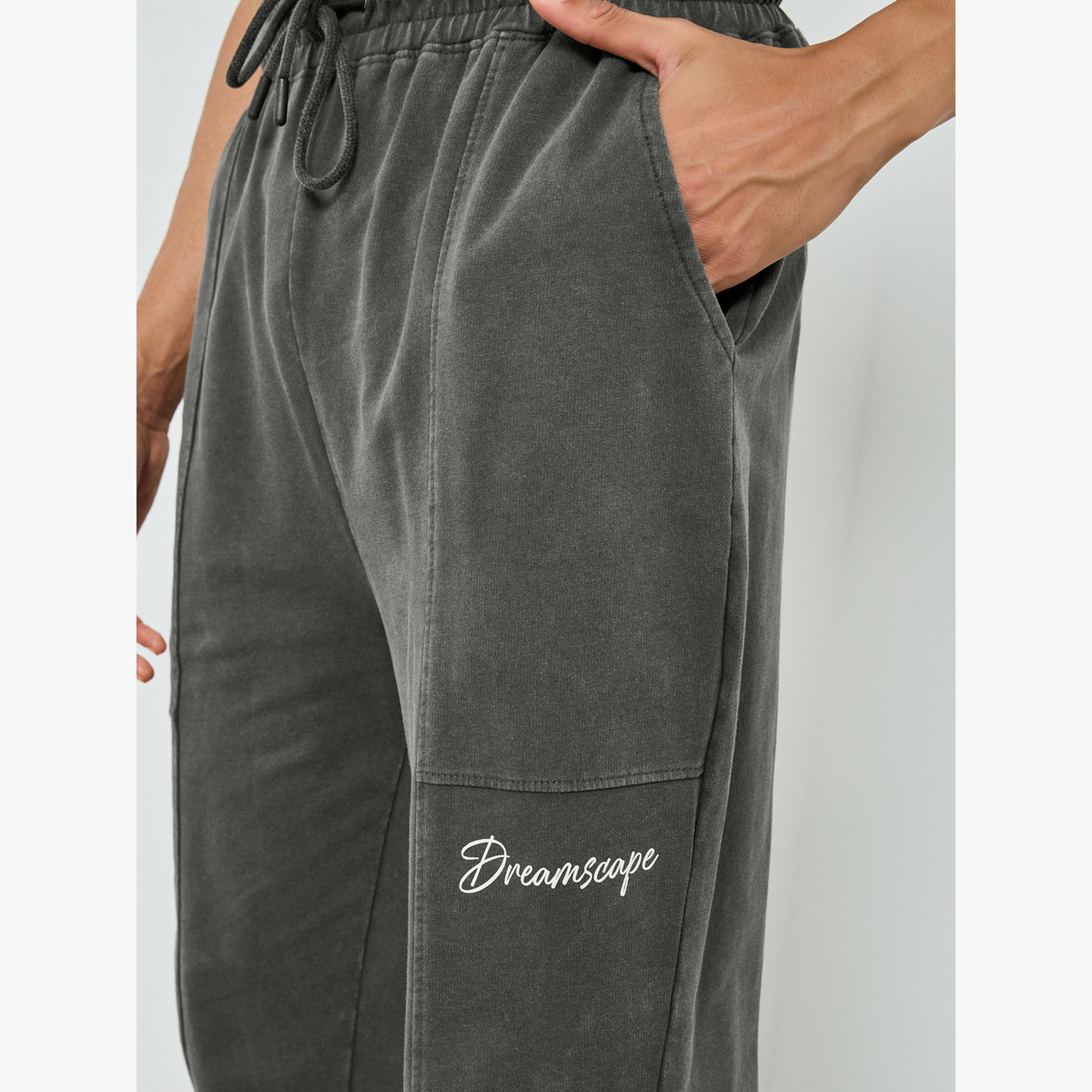 جوغر قصة واسعة بأجزاء مباينة وغسيل باهت-men-clothing-bottoms-joggers-image-3