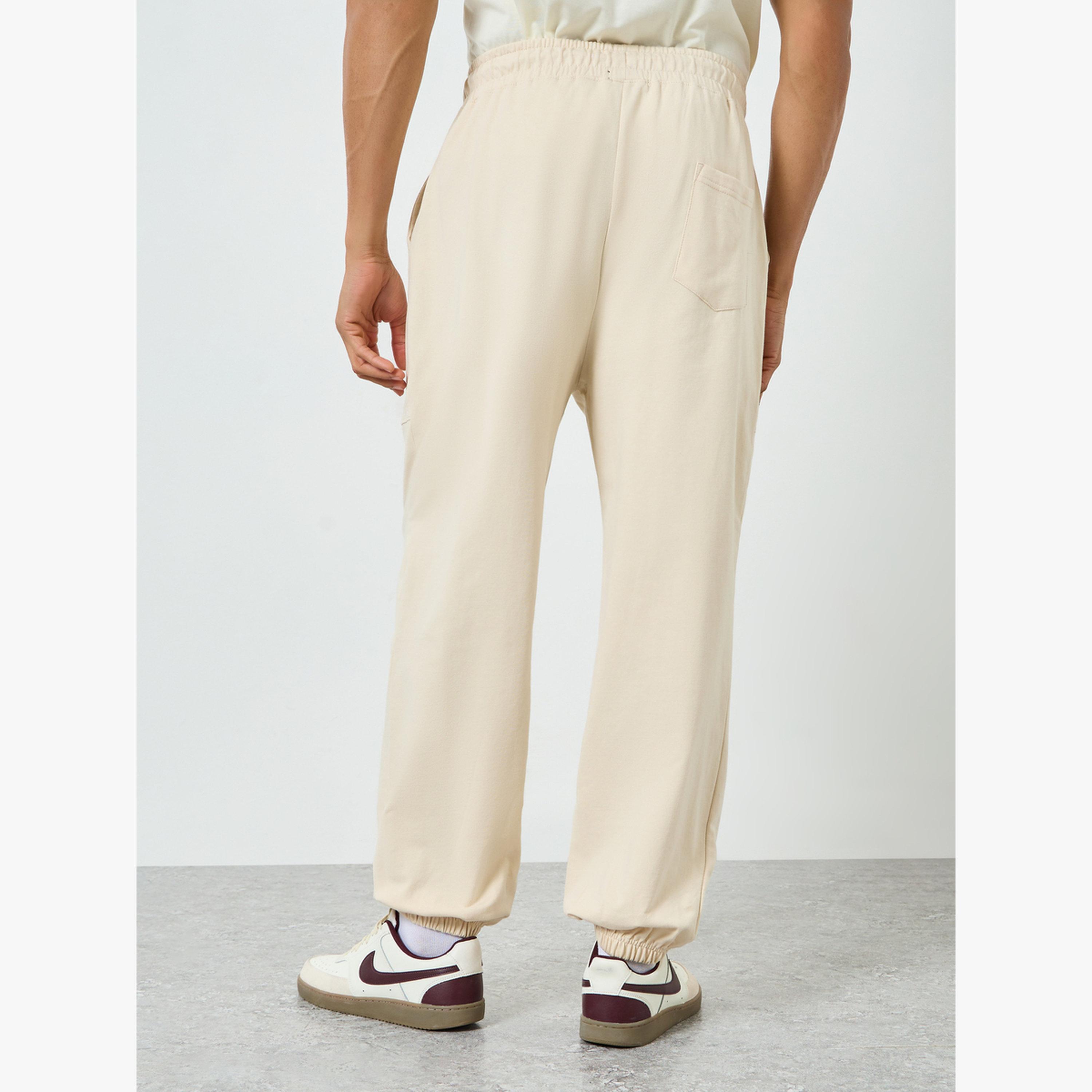 جوغر قصة واسعة بأجزاء مباينة-men-clothing-bottoms-joggers-image-4