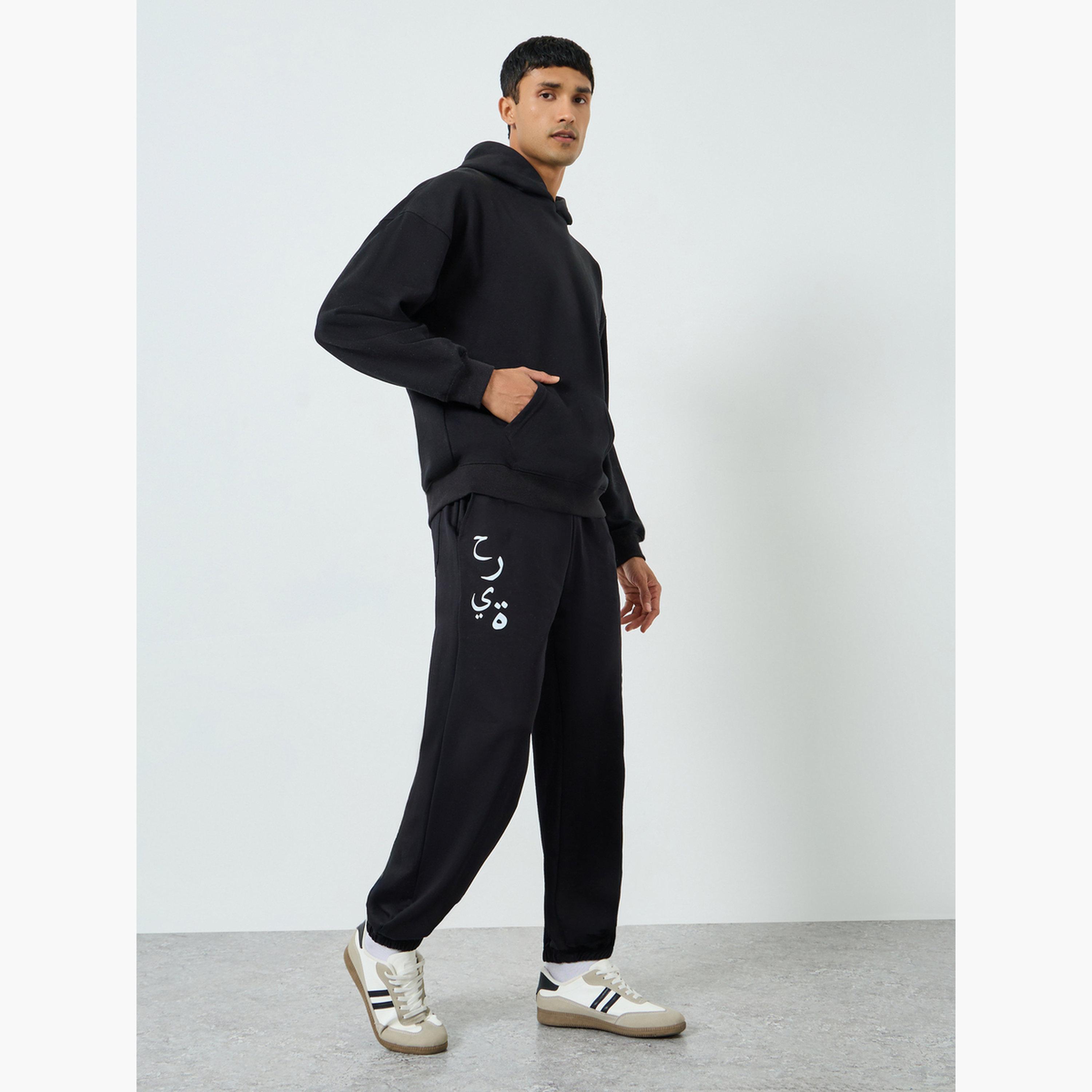 جوغر رجالي أسود بطبعة جرافيك-men-clothing-bottoms-joggers-image-2