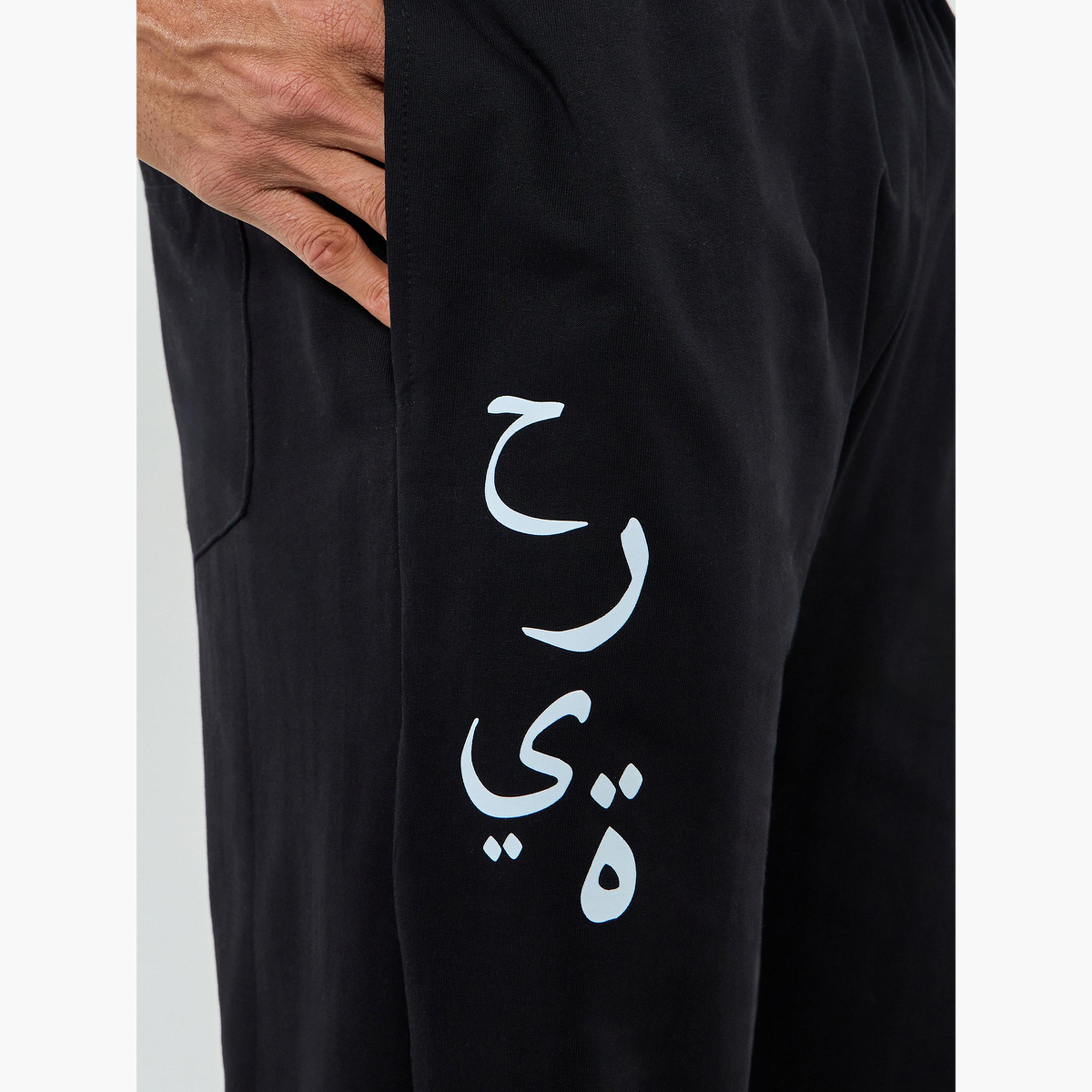 جوغر رجالي أسود بطبعة جرافيك-men-clothing-bottoms-joggers-image-4