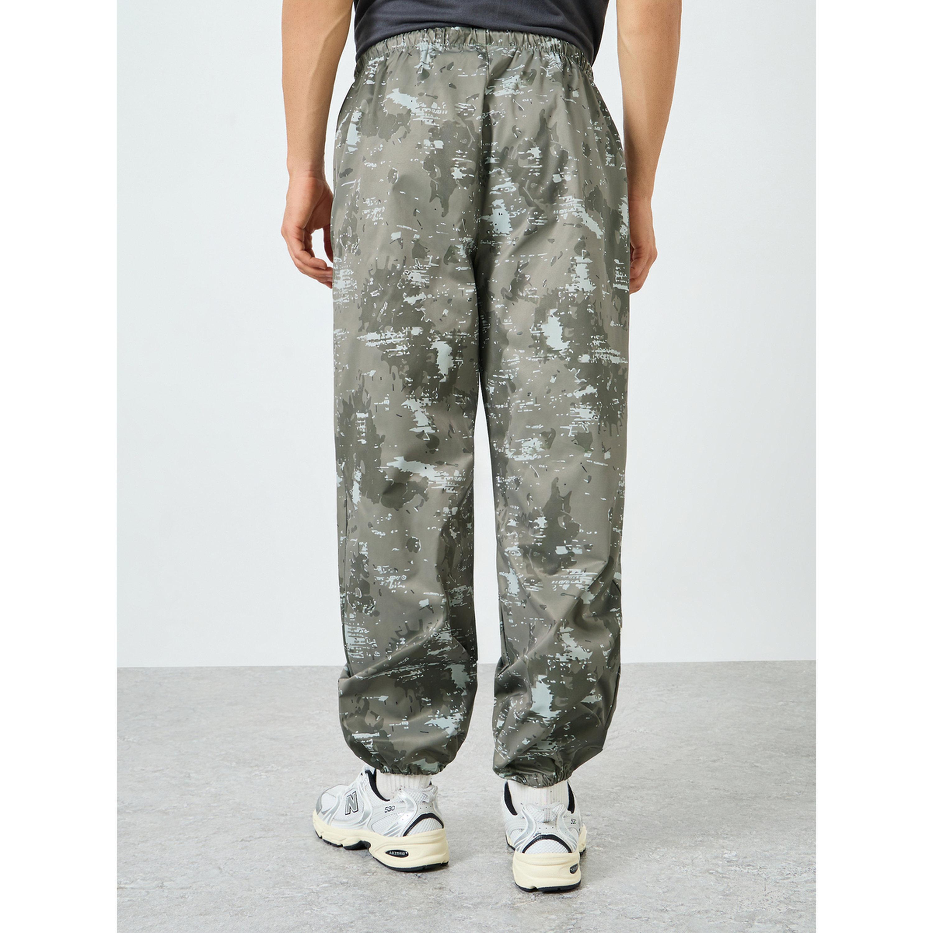 Styli Men Olive Printed Relaxed Track Pants-men-clothing-sportswearandactivewear-bottoms-joggers-image-4