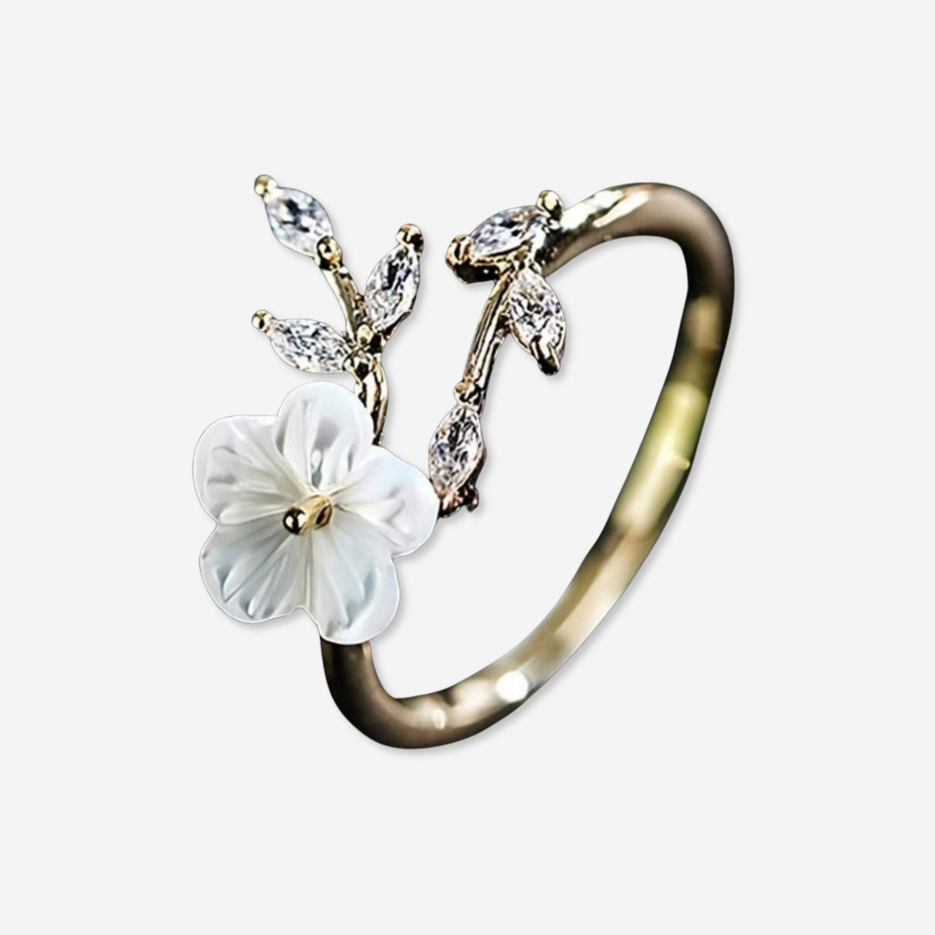 تيك تو - خاتم على شكل زهرة مزين بأحجار كريستالية-women-watchesandjewellery-jewellery-rings-image-1