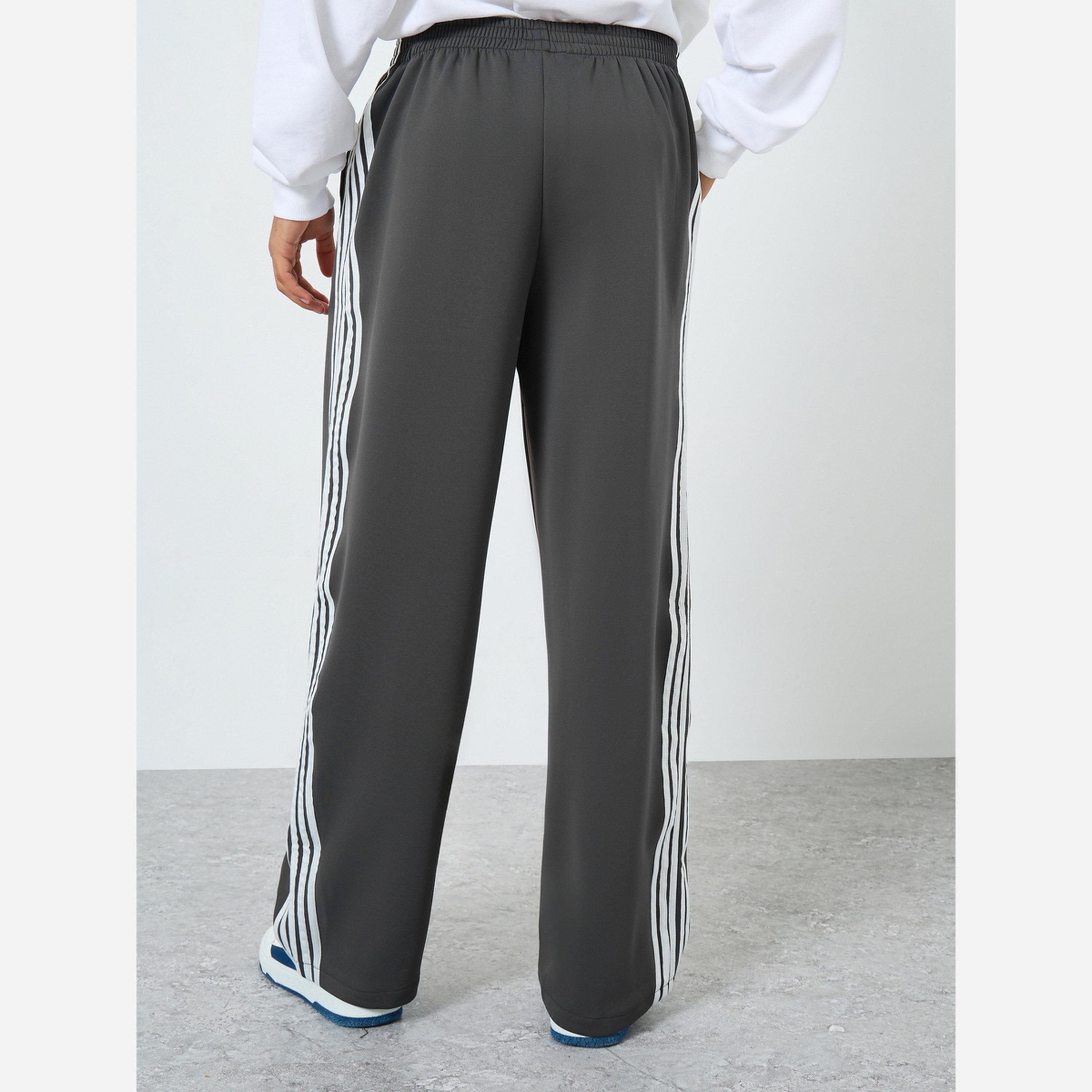 تيك تو - بنطال رياضي رجالي لون رمادي بخطوط جانبية-men-clothing-bottoms-trousersandchinos-trousers-image-4
