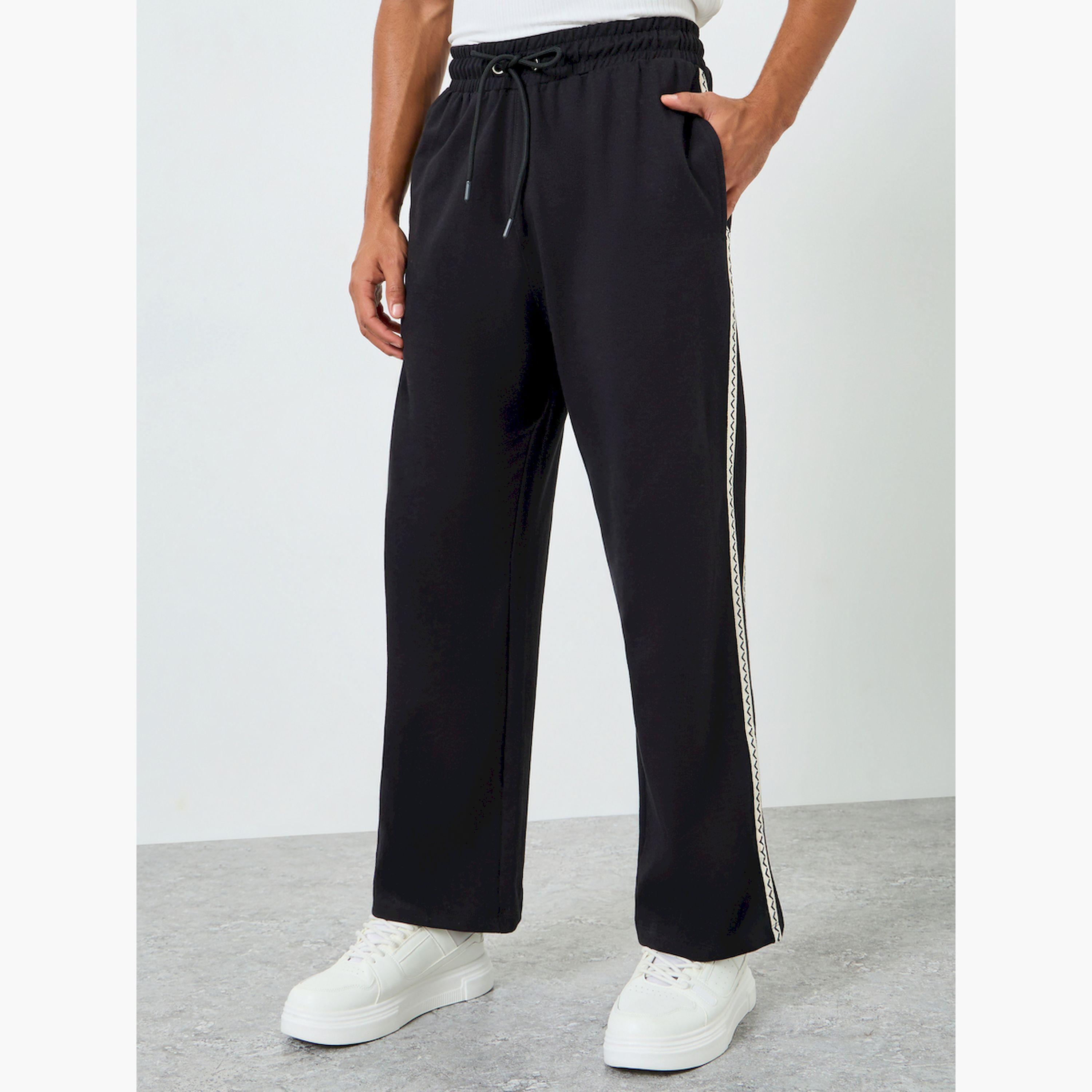 جوغر بقصة واسعة وشريط جانبي بنمط متعرج-men-clothing-bottoms-joggers-image-1