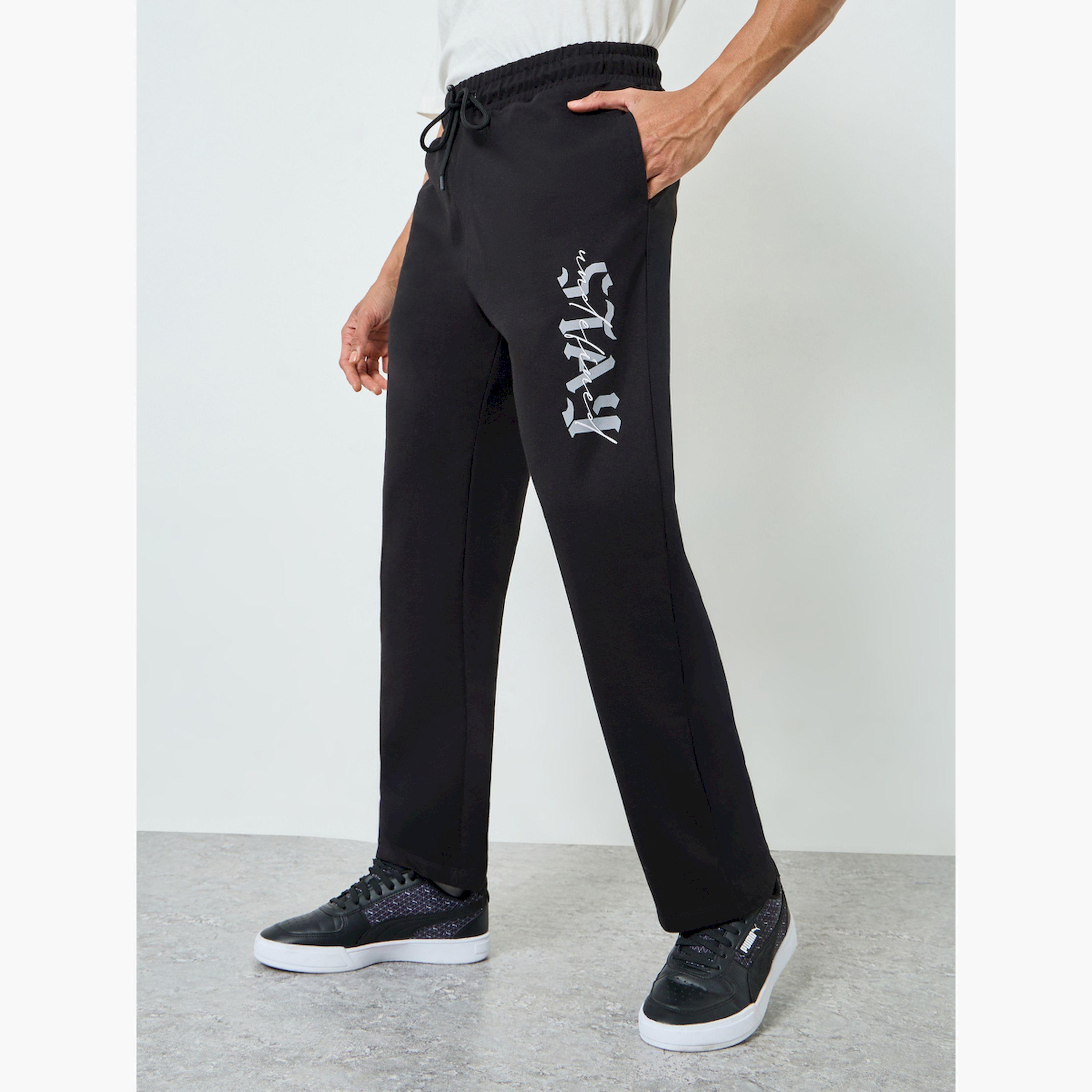 جوغر رجالي أسود مريح بطبعة جرافيك-men-clothing-bottoms-joggers-image-1