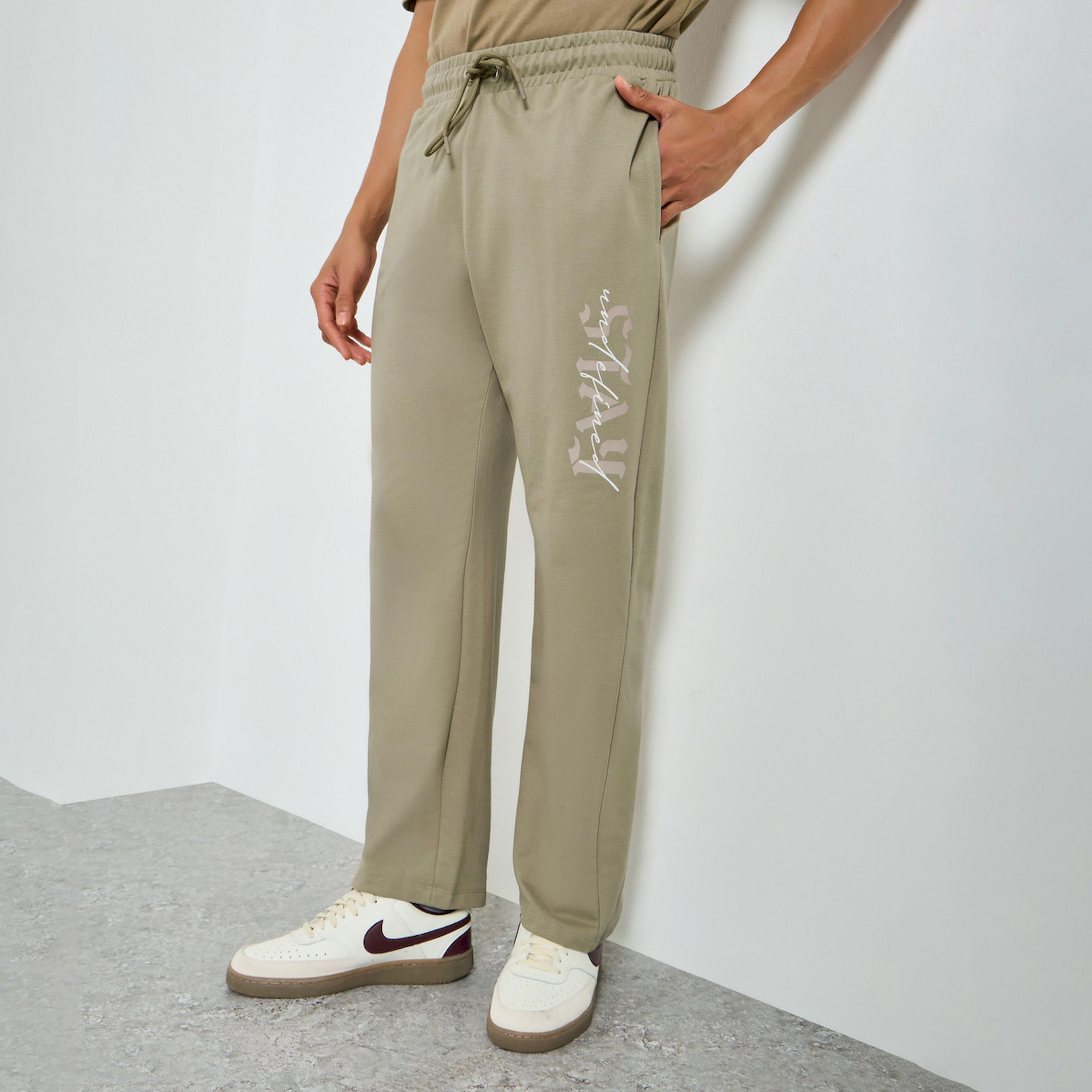 جوغر رجالي أخضر مريح بطبعة جرافيك-men-clothing-bottoms-joggers-image-1