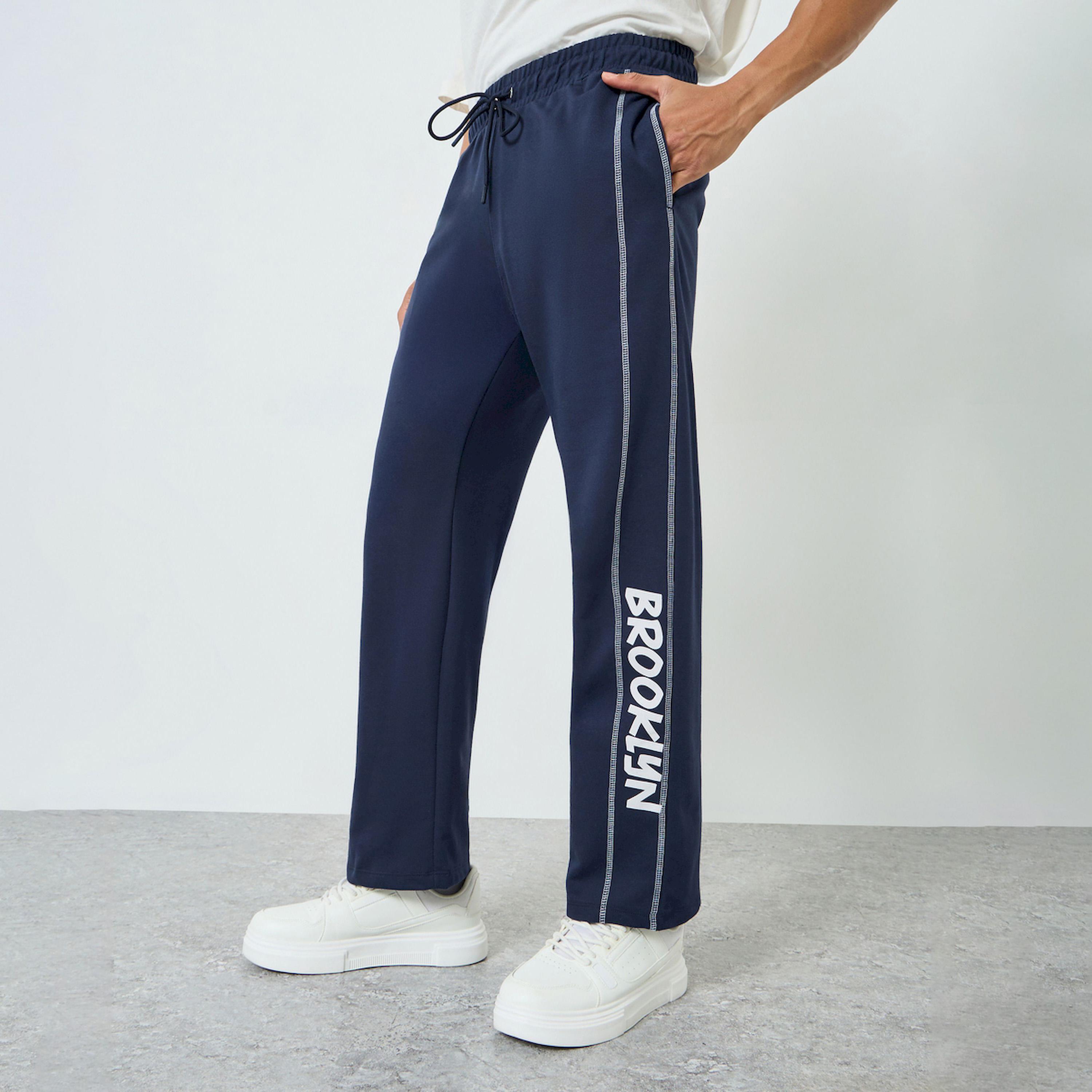 جوغر رجالي كحلي واسع مع أجزاء جانبية مطبوعة-men-clothing-bottoms-joggers-image-1