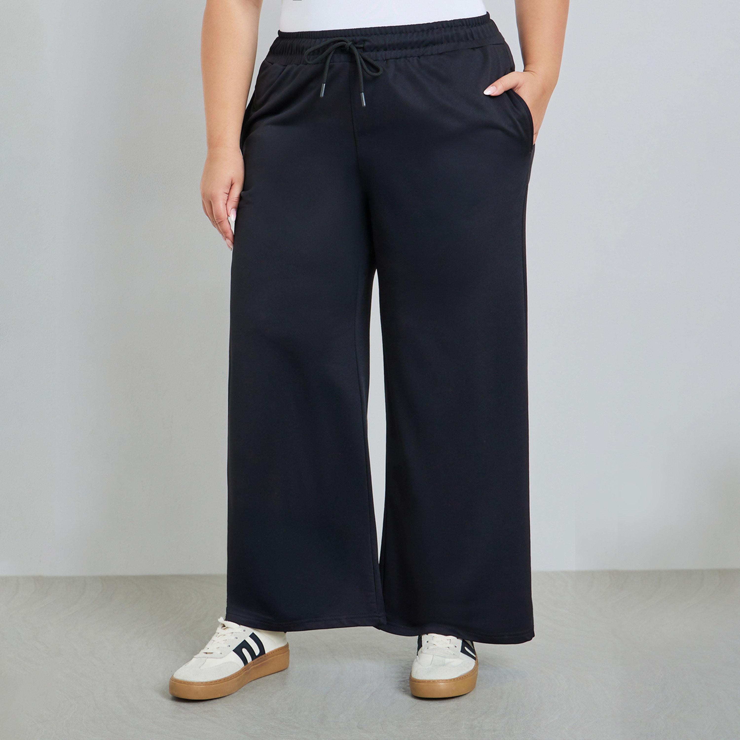جوغر بأرجل واسعة مقاس كبير أسود-women-clothing-bottoms-joggers-image-1