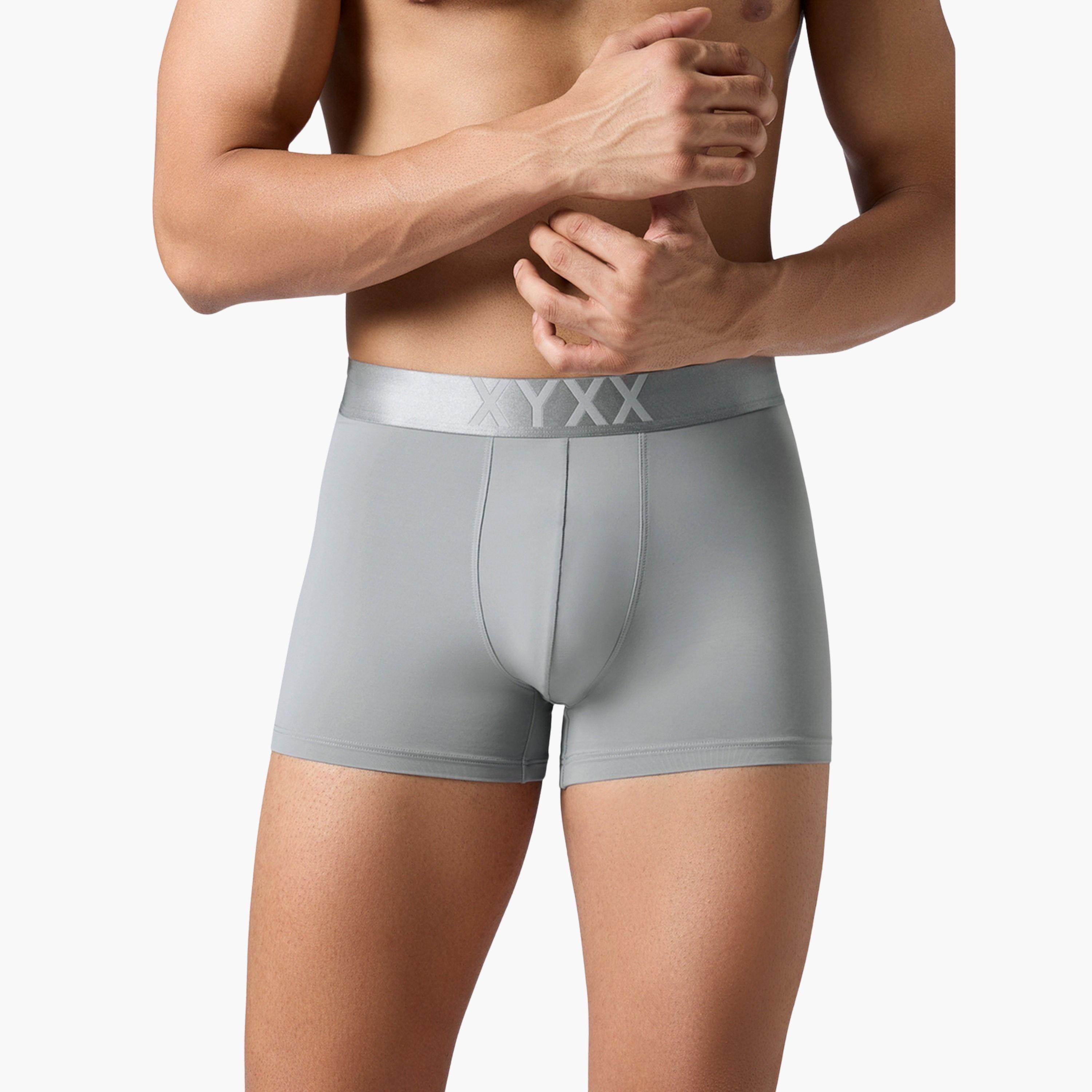 اكس واي اكس اكس - شورت رجالي مطاطي لون سادة - سريع الجفاف (عبوة 8 قطع)-men-clothing-innerwear-underwear-image-1