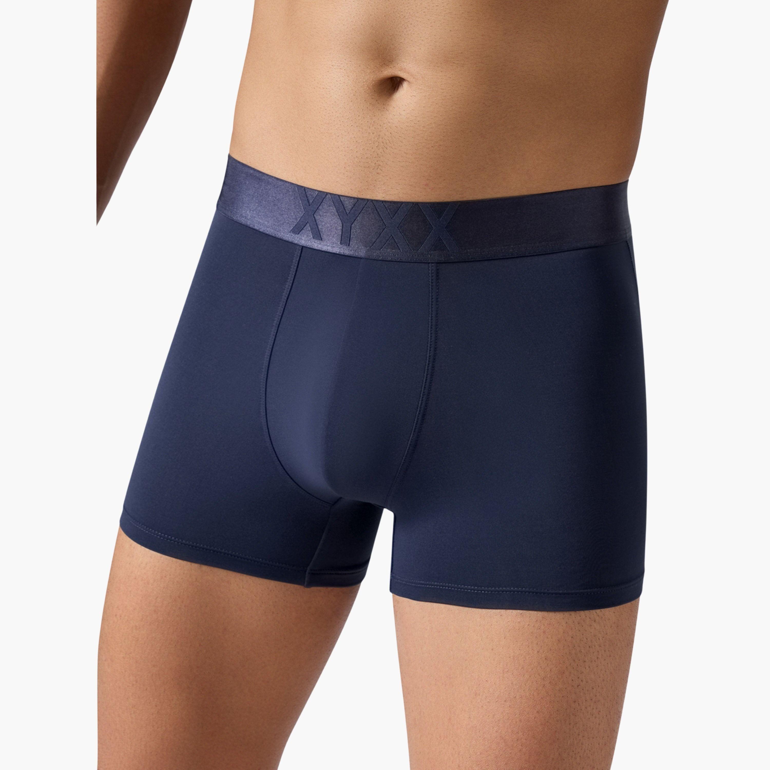 اكس واي اكس اكس - شورت رجالي مطاطي لون سادة - سريع الجفاف (عبوة 8 قطع)-men-clothing-innerwear-underwear-image-2