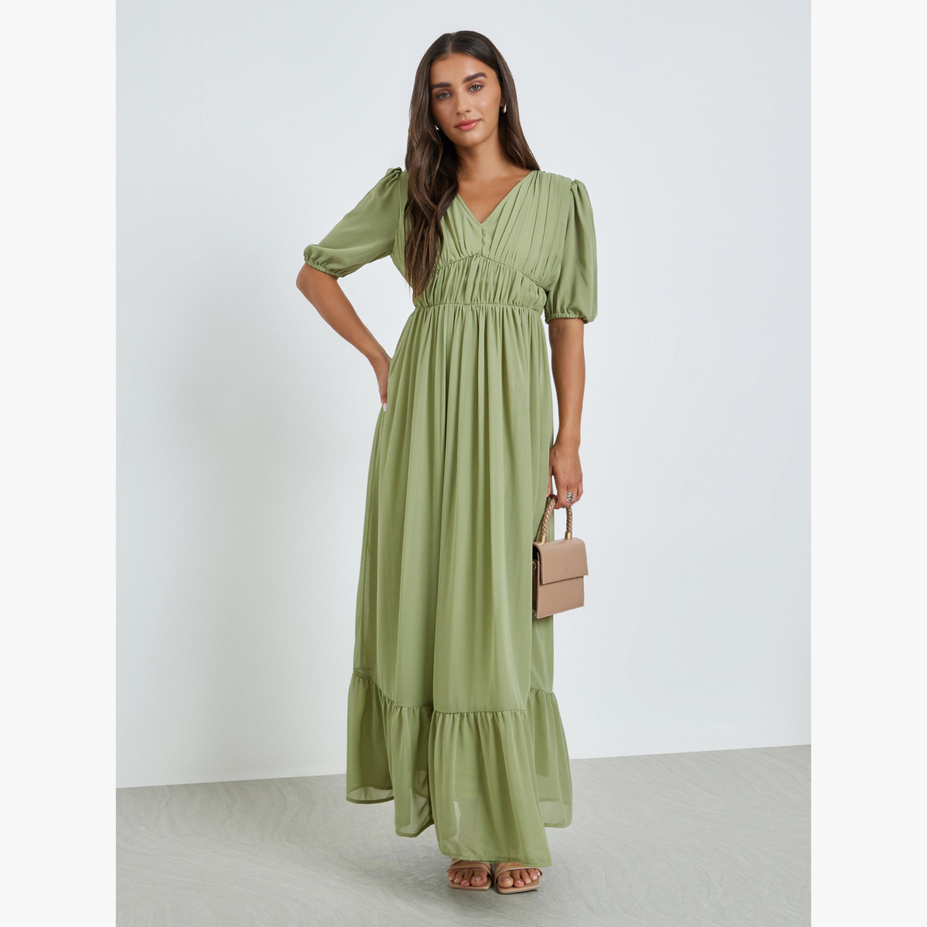 فستان طويل بحافة واسعة وتفاصيل زمزمة-women-clothing-dresses-image-1
