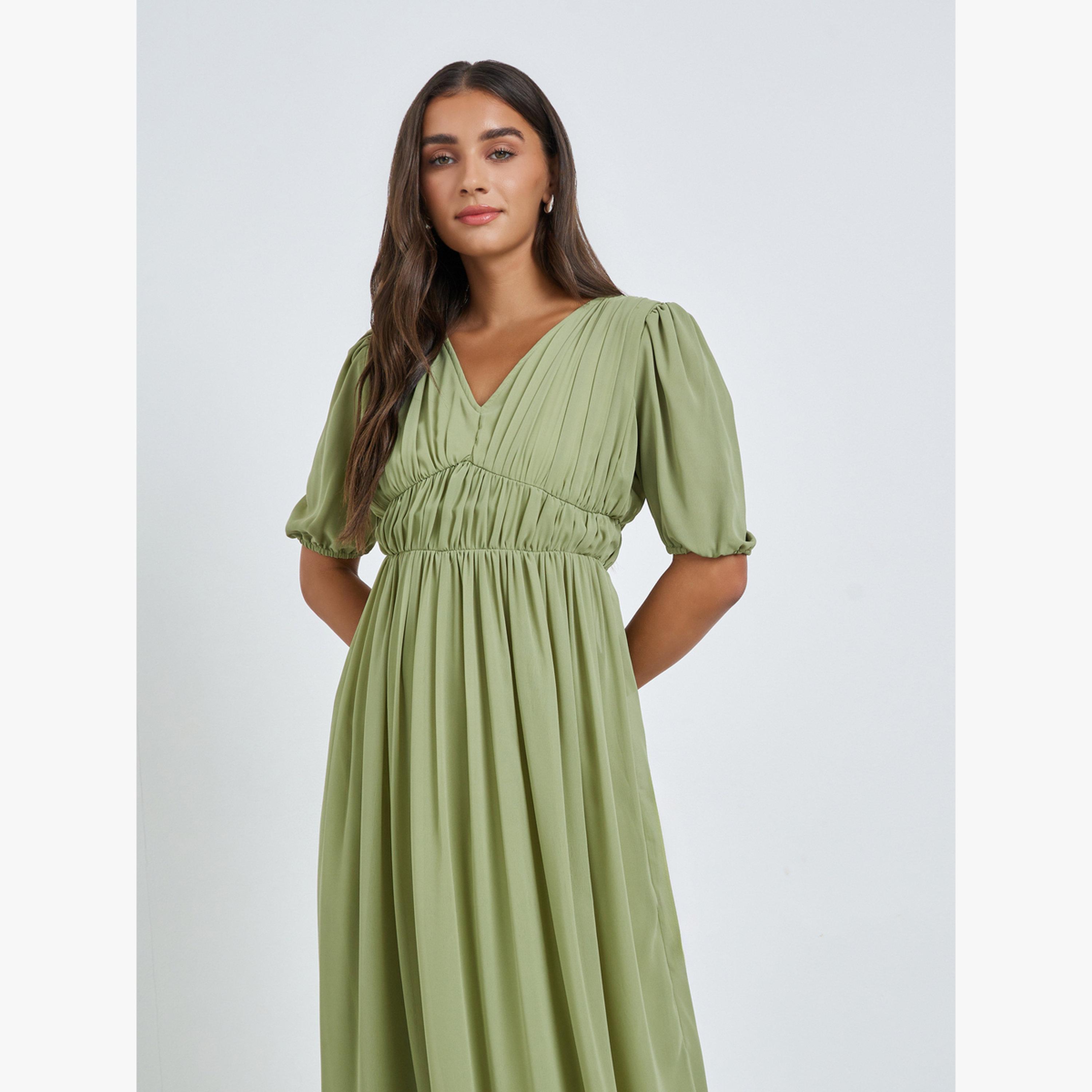 فستان طويل بحافة واسعة وتفاصيل زمزمة-women-clothing-dresses-image-2