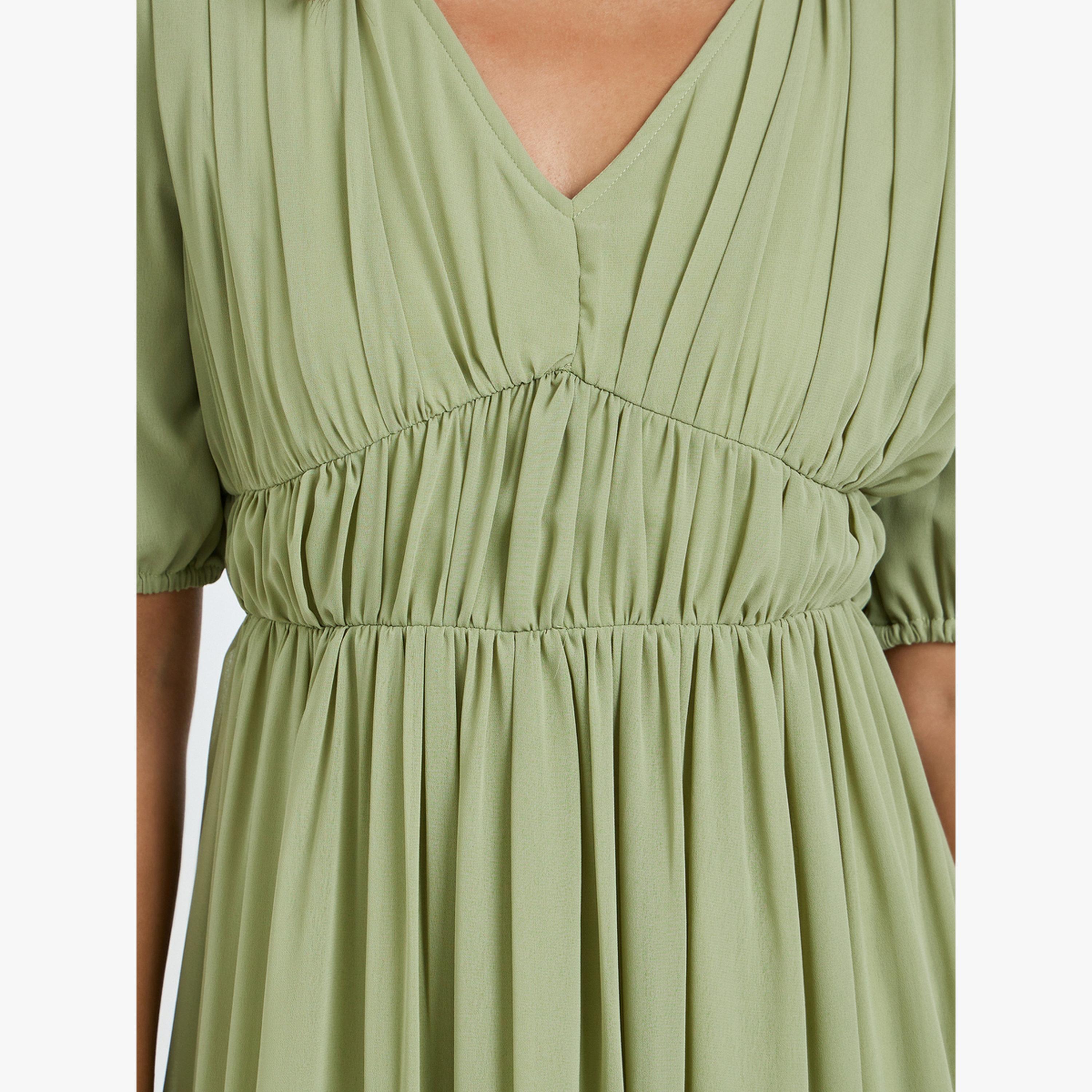 فستان طويل بحافة واسعة وتفاصيل زمزمة-women-clothing-dresses-image-5