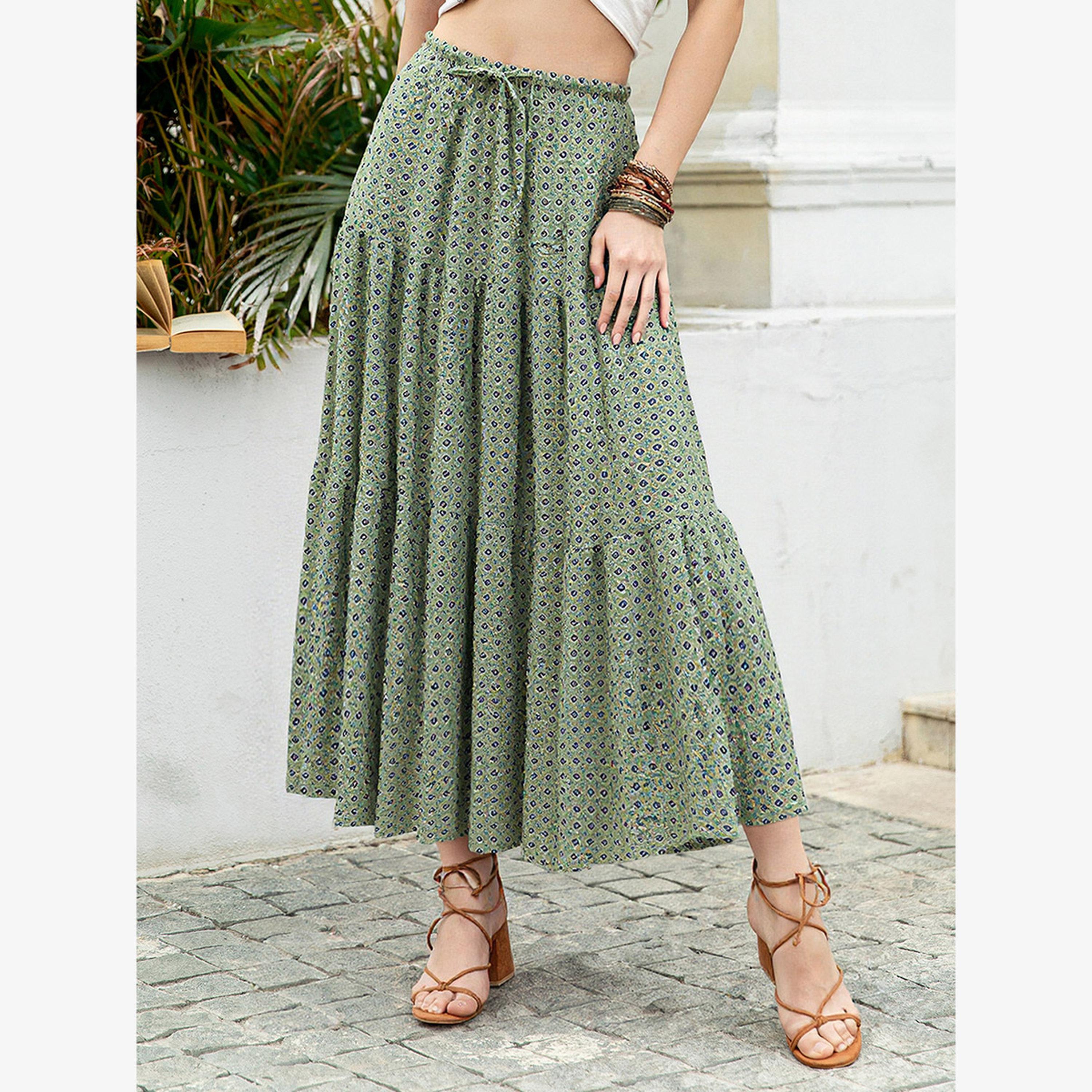 تنورة ميدي مطبوعة برسومات وتفاصيل مطوية-women-clothing-bottoms-skirts-image-3