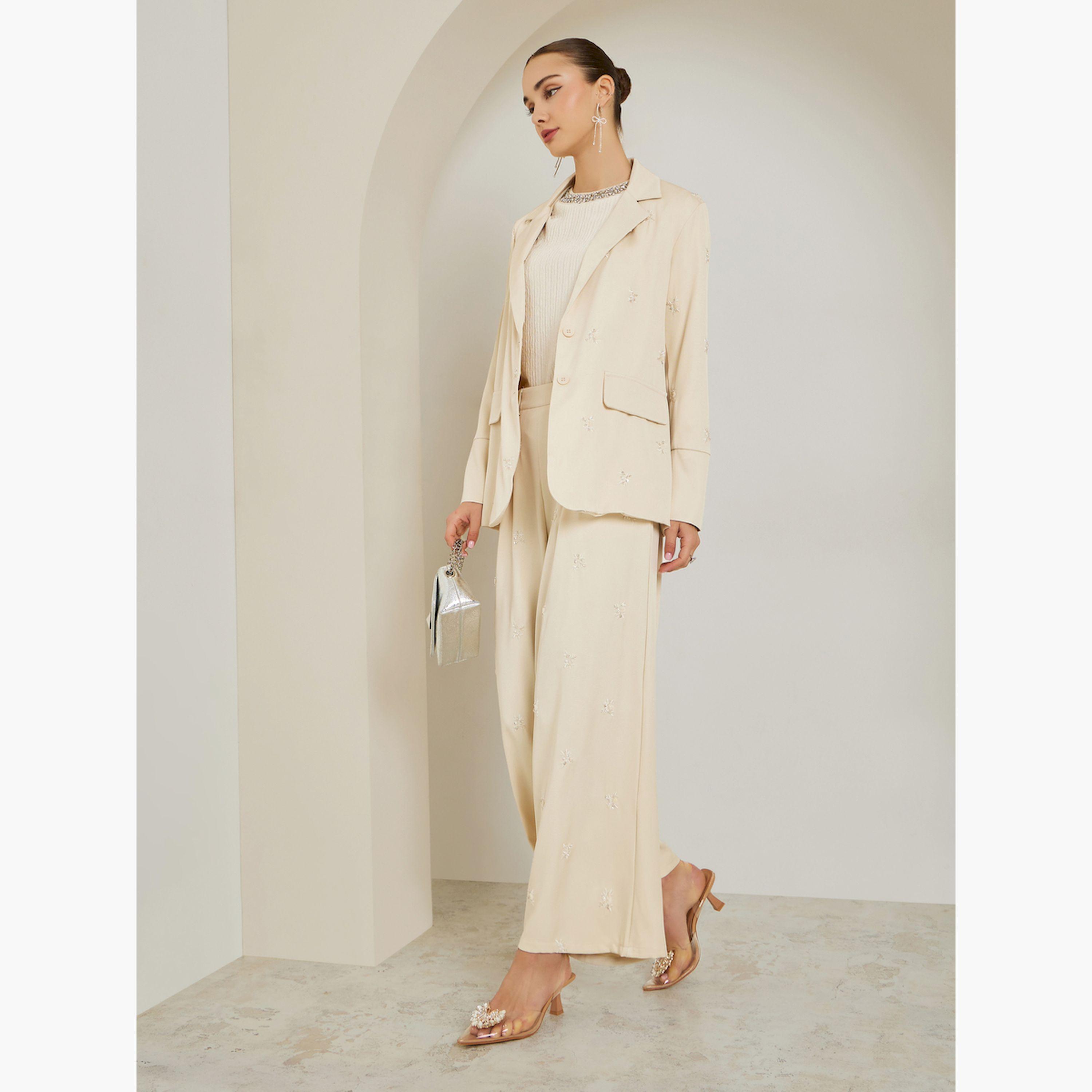 بنطال أوف وايت مزين وأرجل واسعة-women-clothing-bottoms-trousers-image-3