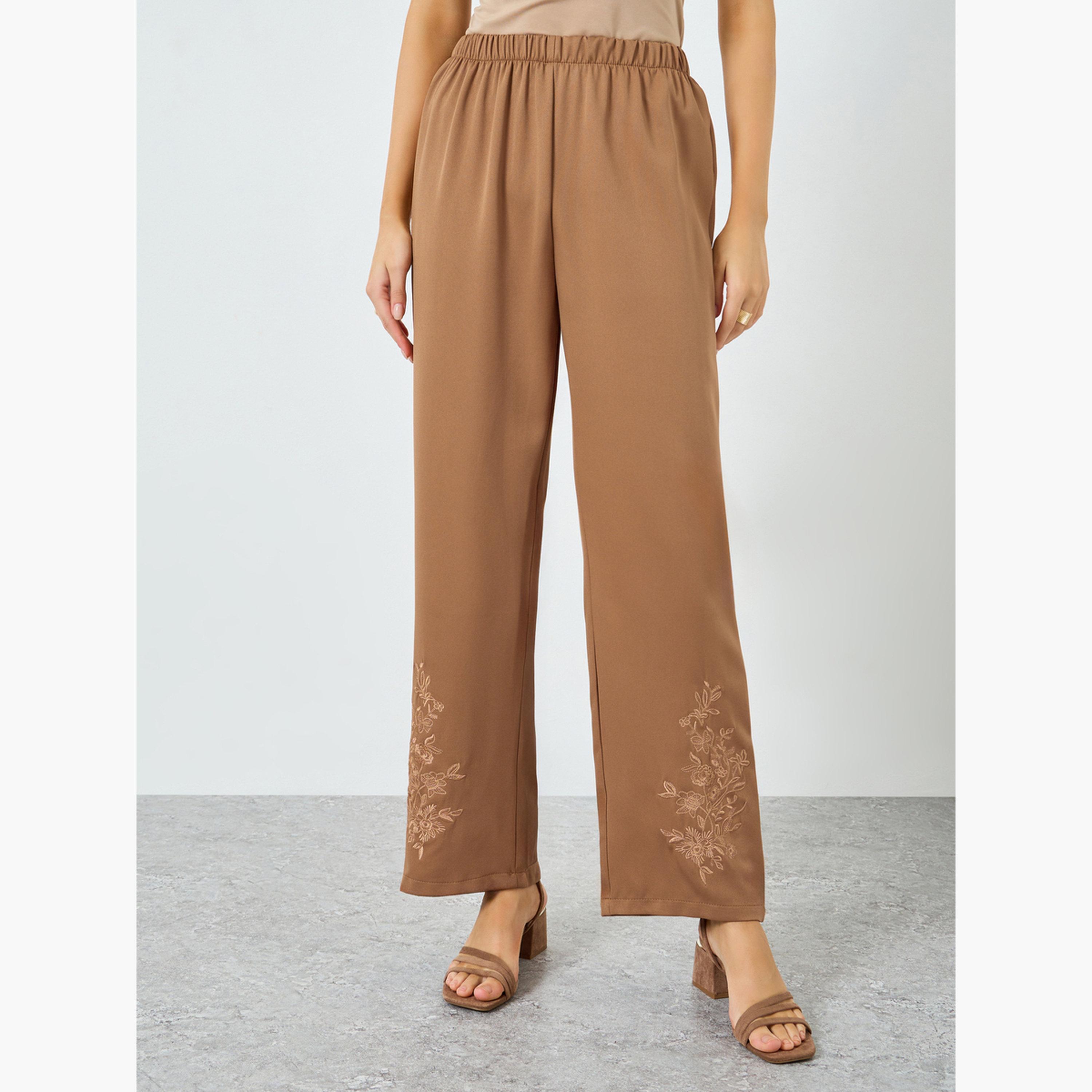 بنطال بأرجل واسعة وتفاصيل مُطرّزة-women-clothing-bottoms-trousers-image-1